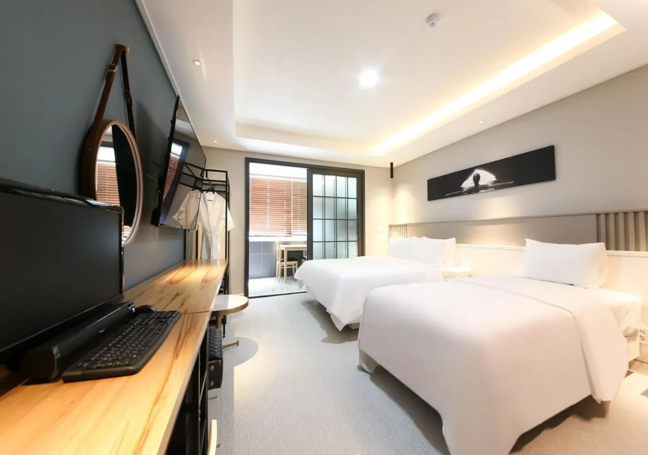 Photo of the whole room, Bed in West In Hotel Yeosu
