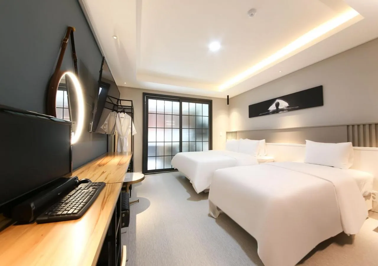 Photo of the whole room, Bed in West In Hotel Yeosu