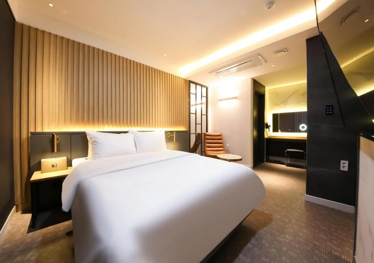 Photo of the whole room, Bed in West In Hotel Yeosu