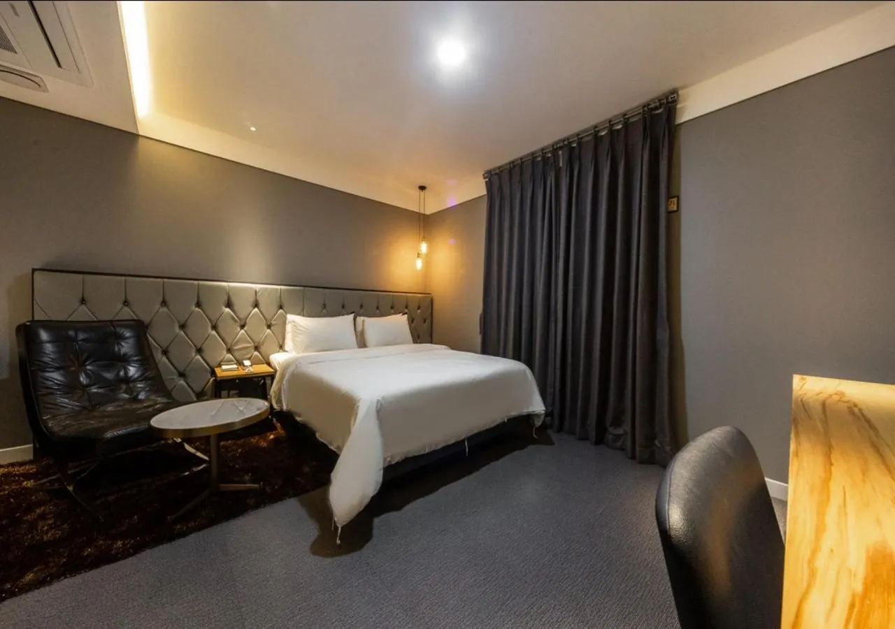 Photo of the whole room, Bed in West In Hotel Yeosu