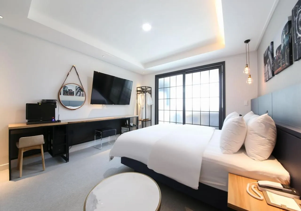 Photo of the whole room, Bed in West In Hotel Yeosu