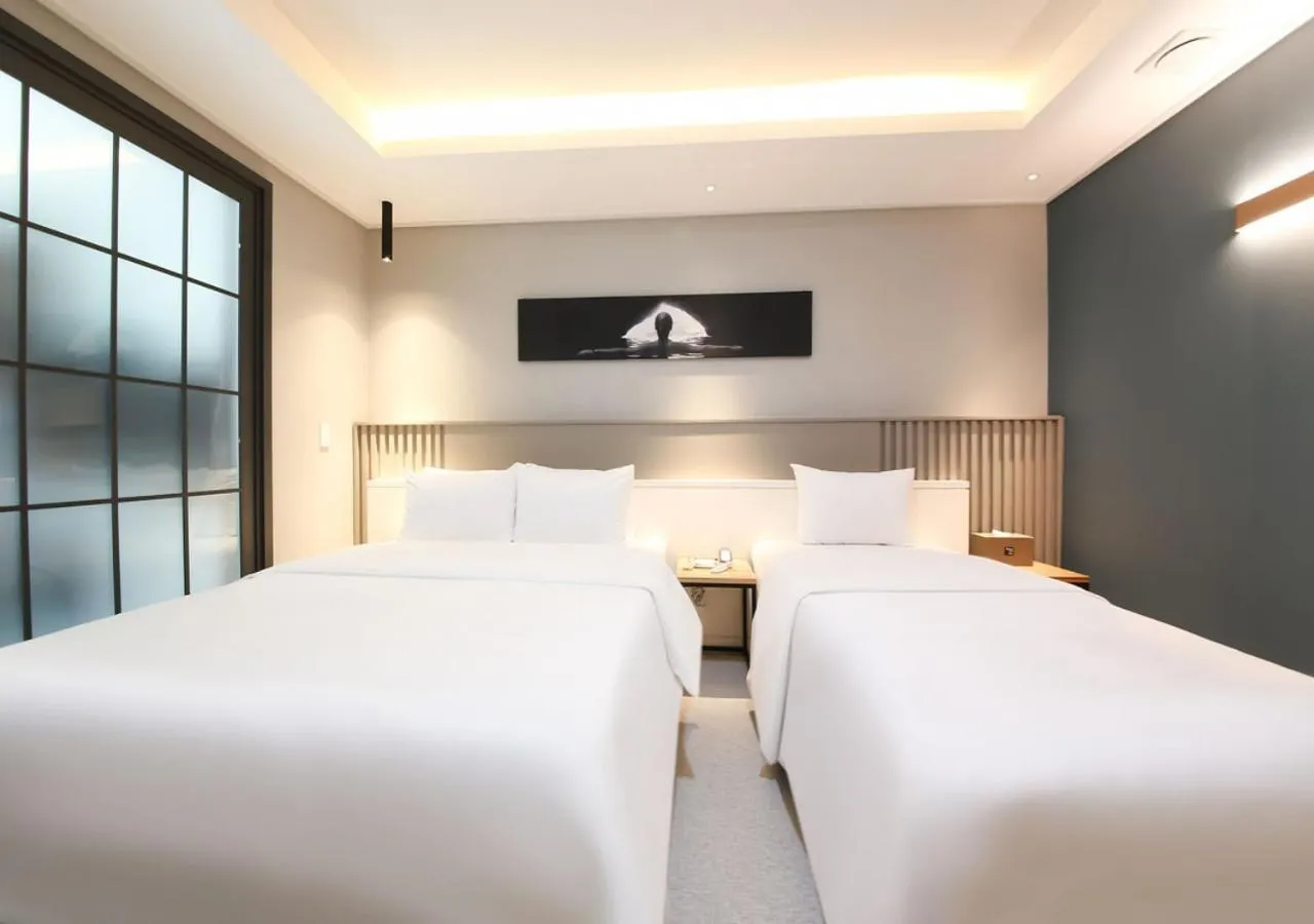 Bed in West In Hotel Yeosu