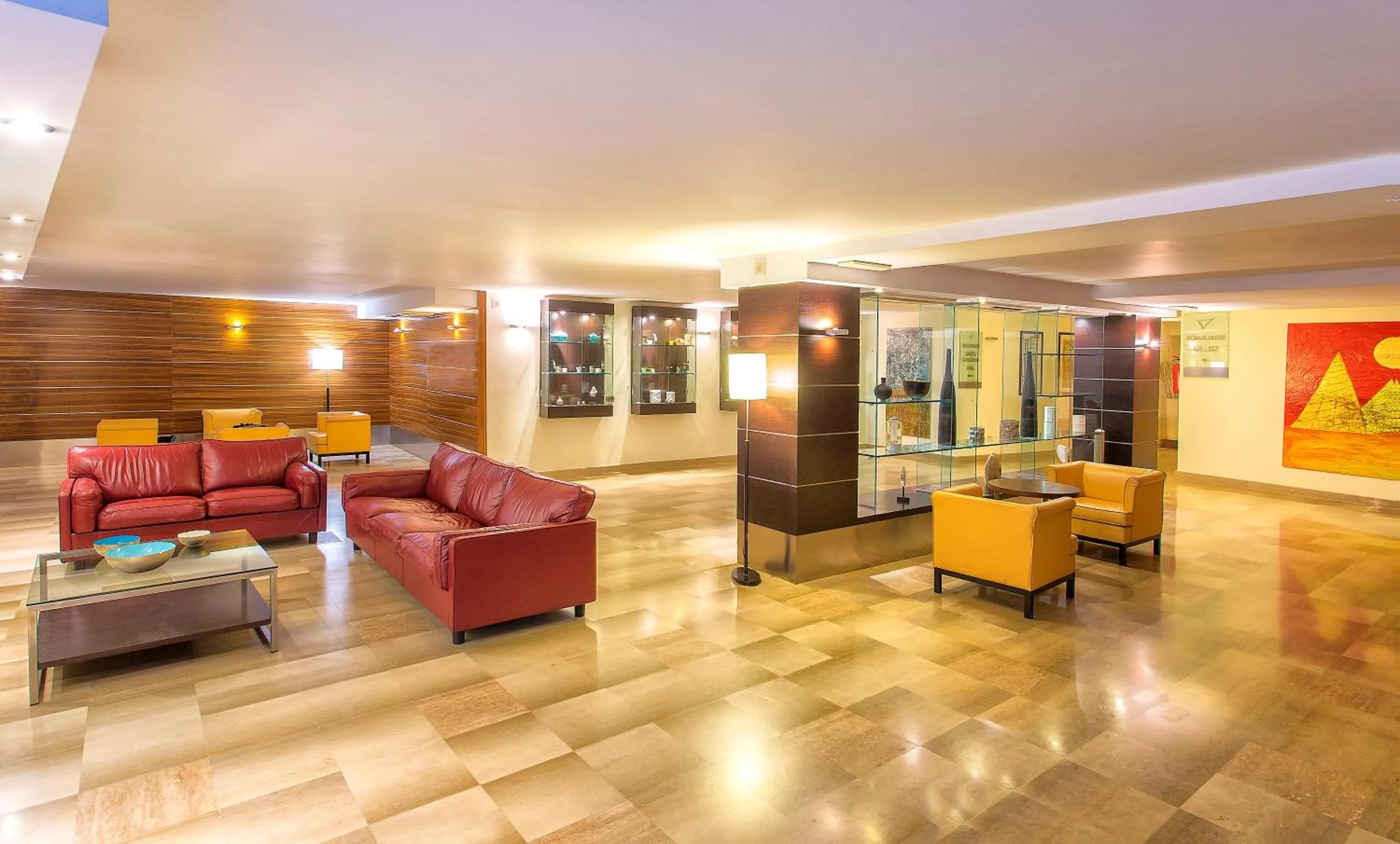 Communal lounge/ TV room in Virgilio Grand Hotel