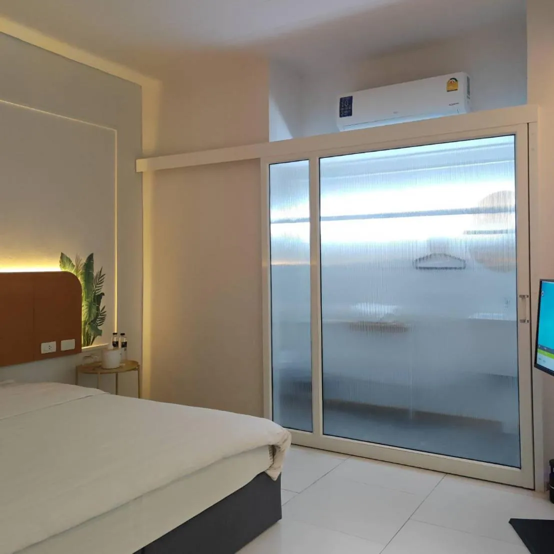 Photo of the whole room, Bed in INNLUXPHUKET