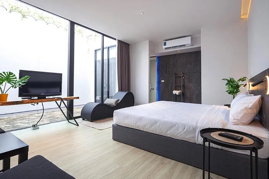 Photo of the whole room, Bed in INNLUXPHUKET