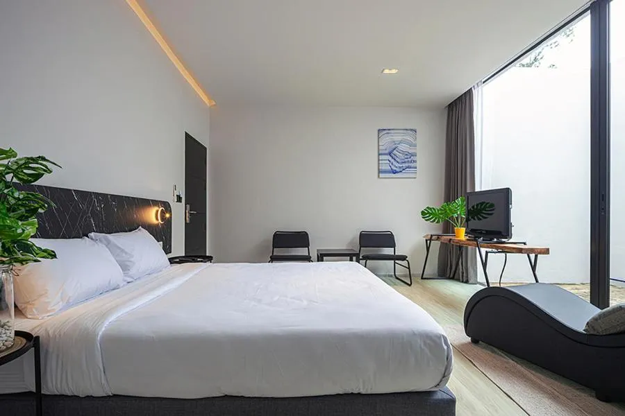 Photo of the whole room, Bed in INNLUXPHUKET