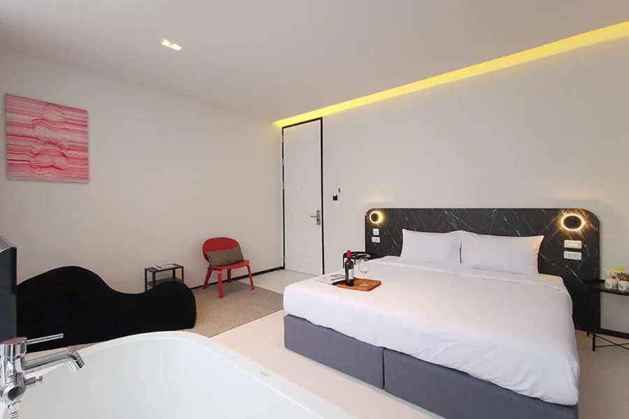 Photo of the whole room, Bed in INNLUXPHUKET