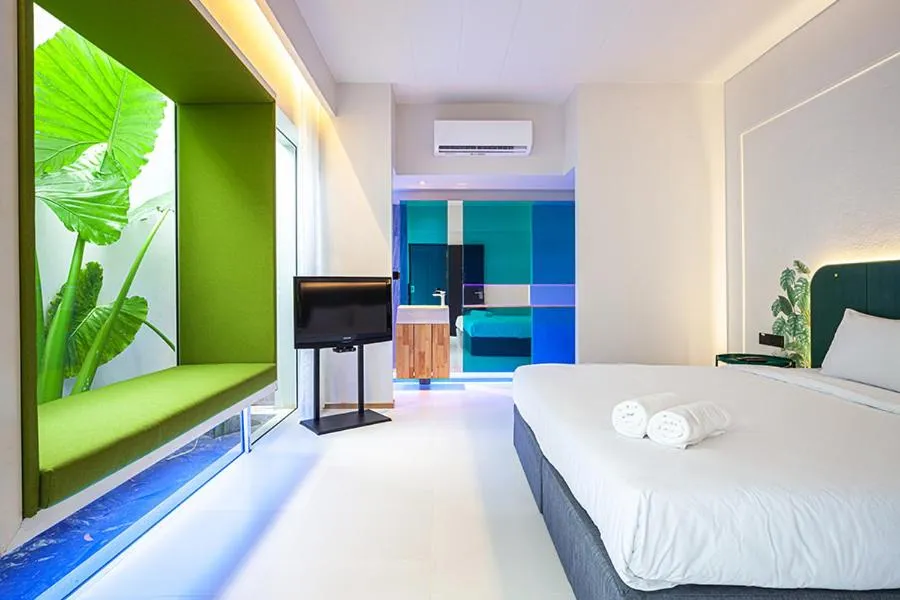 Photo of the whole room, Bed in INNLUXPHUKET