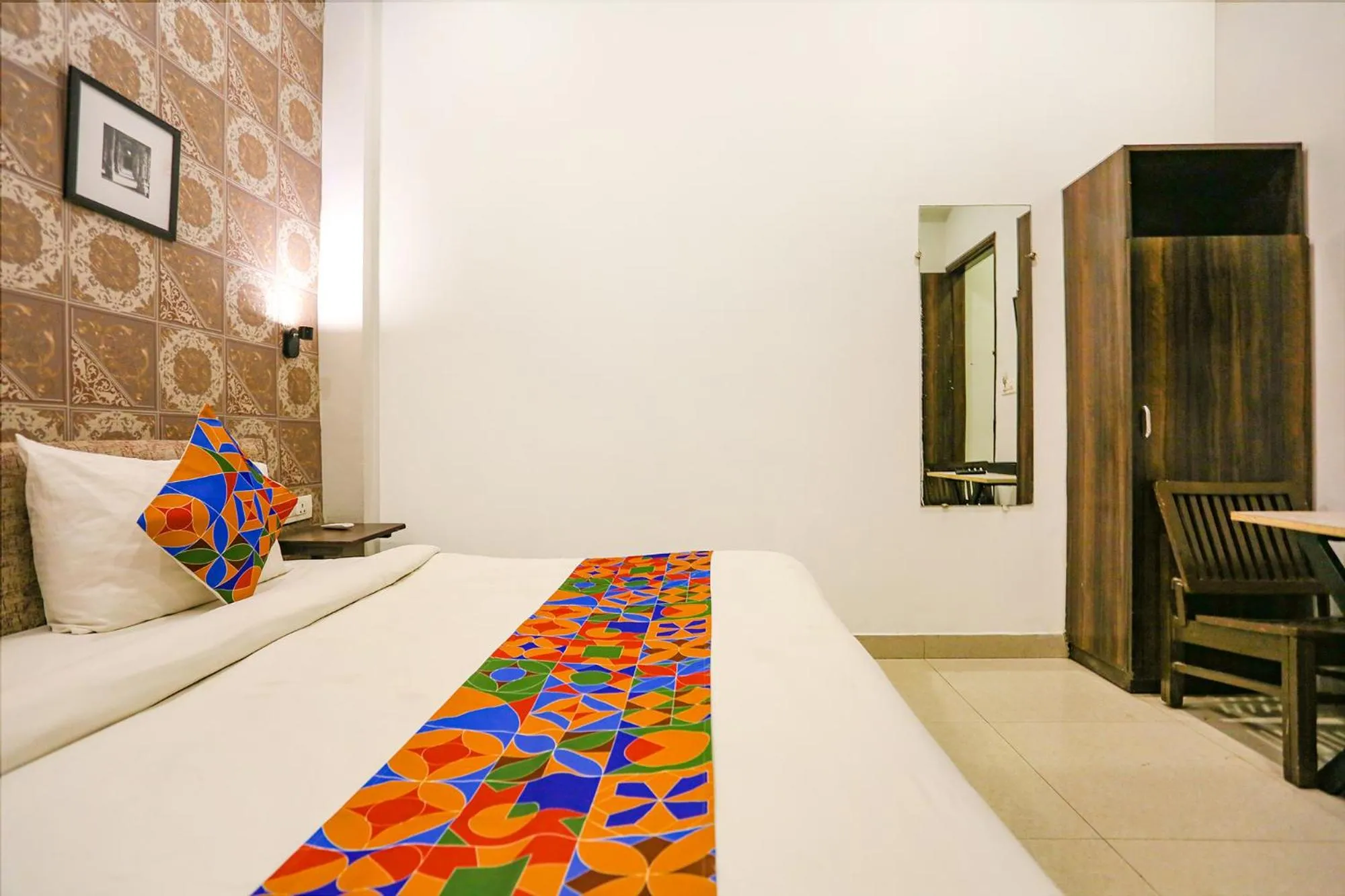 Photo of the whole room, Bed in FabExpress Novel Suites - Nr Yashobhoomi Convention Centre