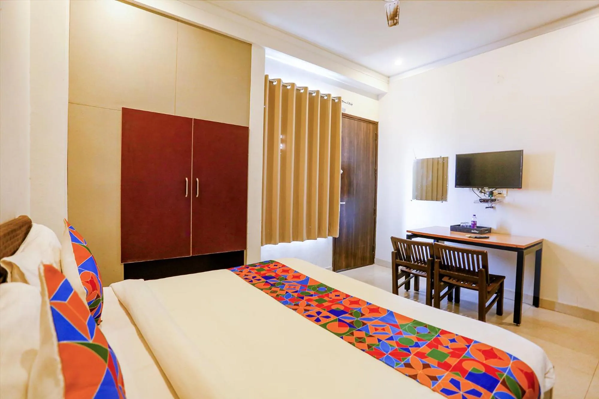 Communal lounge/ TV room, Bed in FabHotel Novel Suites