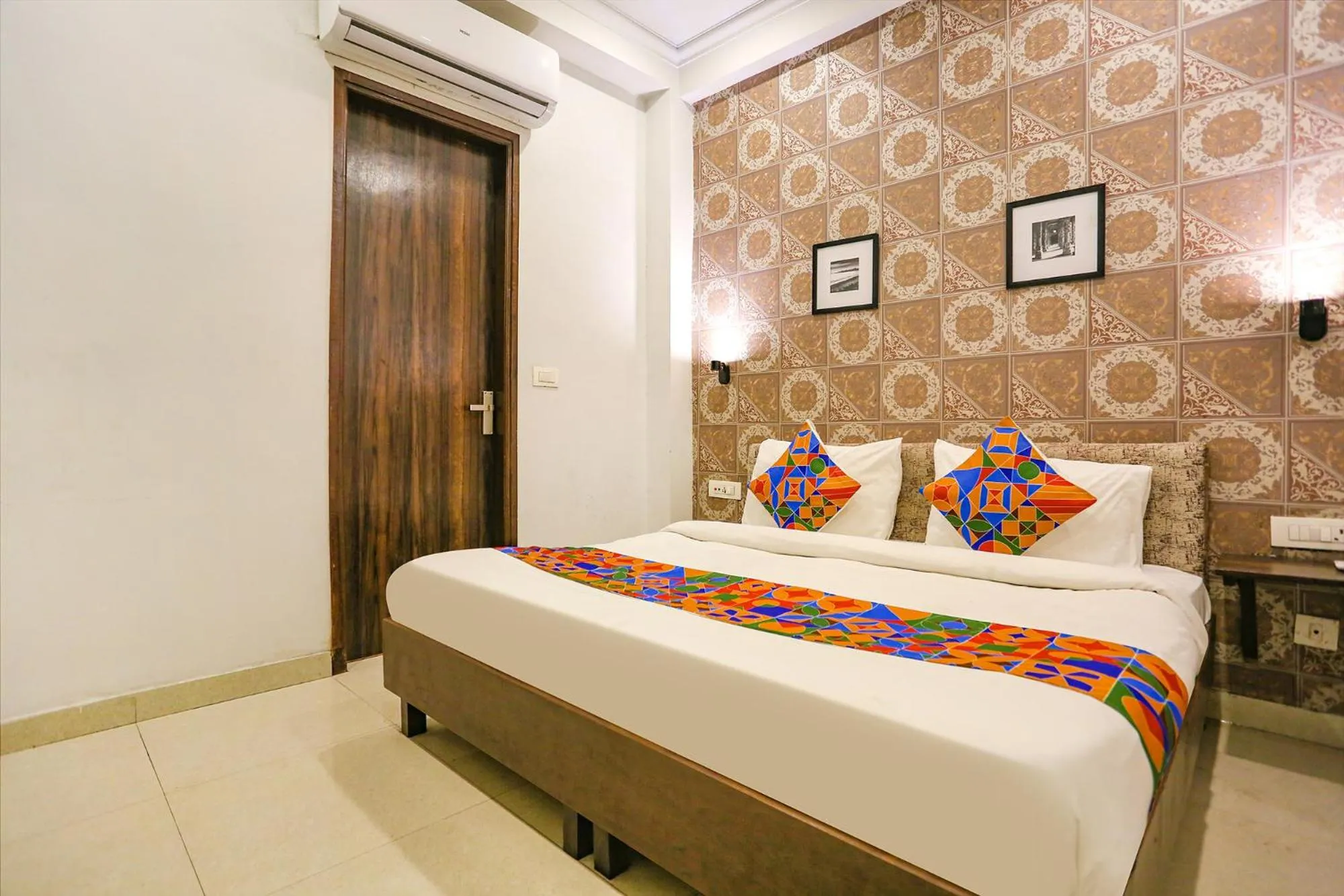 Photo of the whole room, Bed in FabExpress Novel Suites - Nr Yashobhoomi Convention Centre