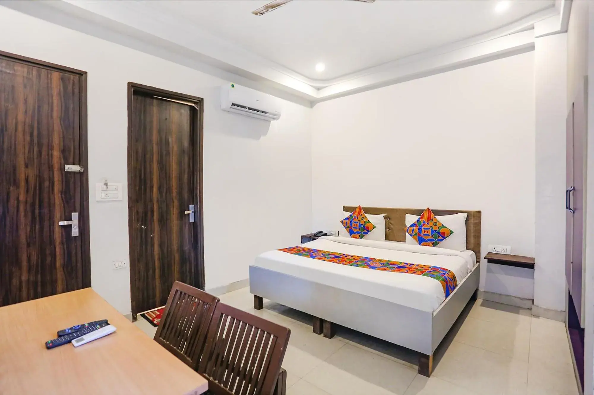 Bedroom, Bed in FabExpress Novel Suites - Nr Yashobhoomi Convention Centre Bedroom, Bed in FabExpress Novel Suites - Nr Yashobhoomi Convention Centre