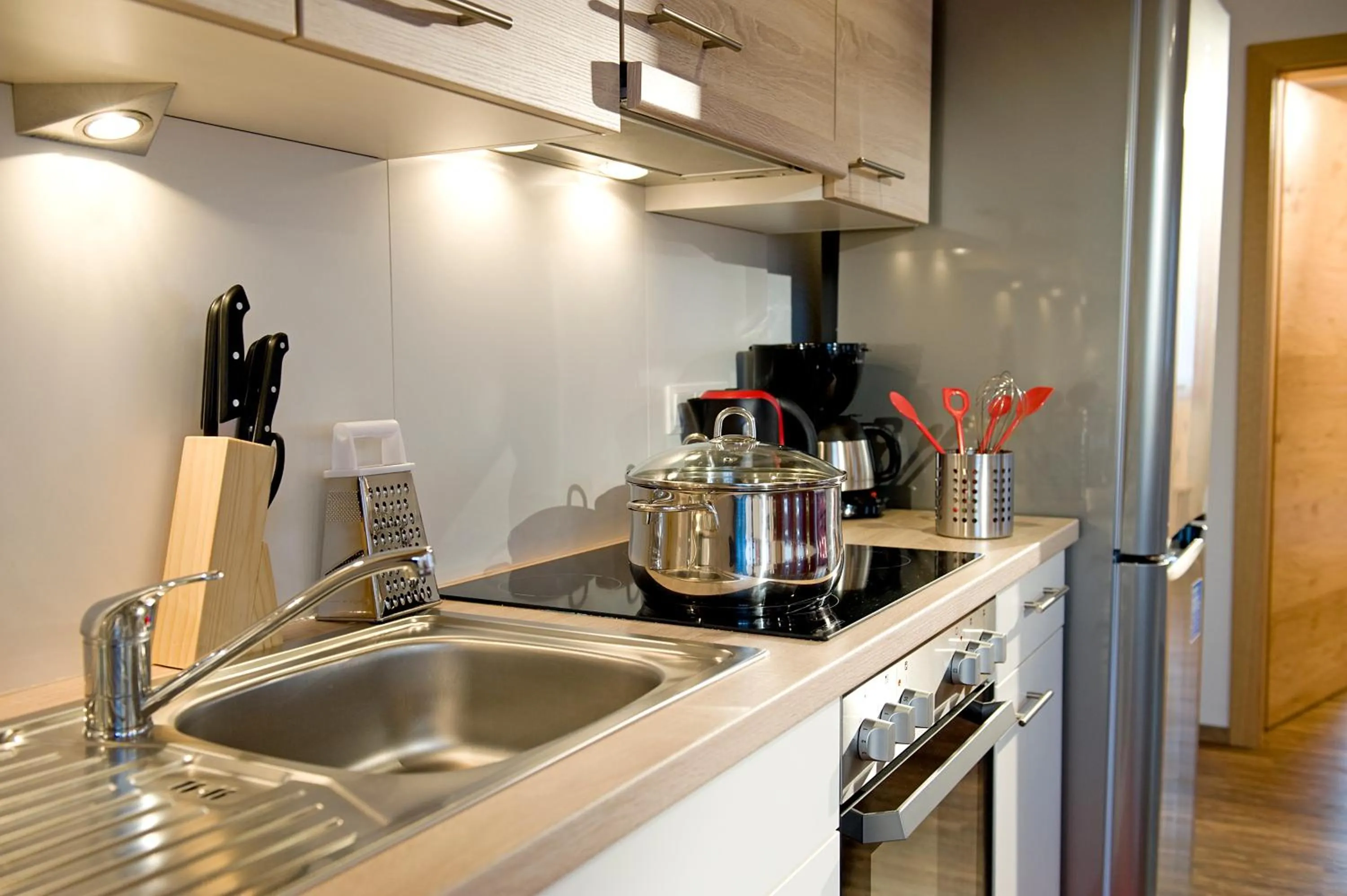 Kitchen or kitchenette in AlpenChalet Mitterberg