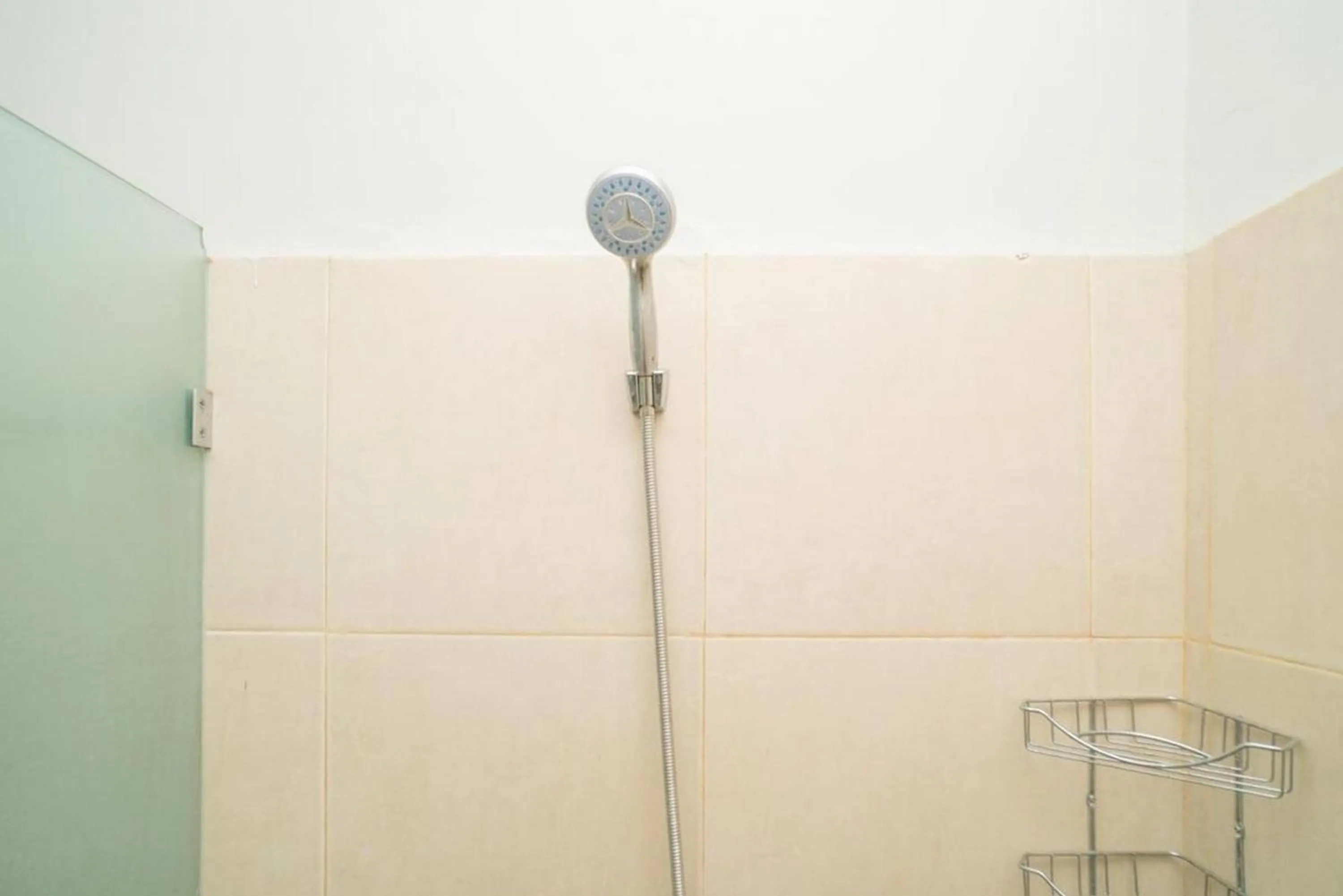 Bathroom in Urbanview Hotel Wayan Mansion