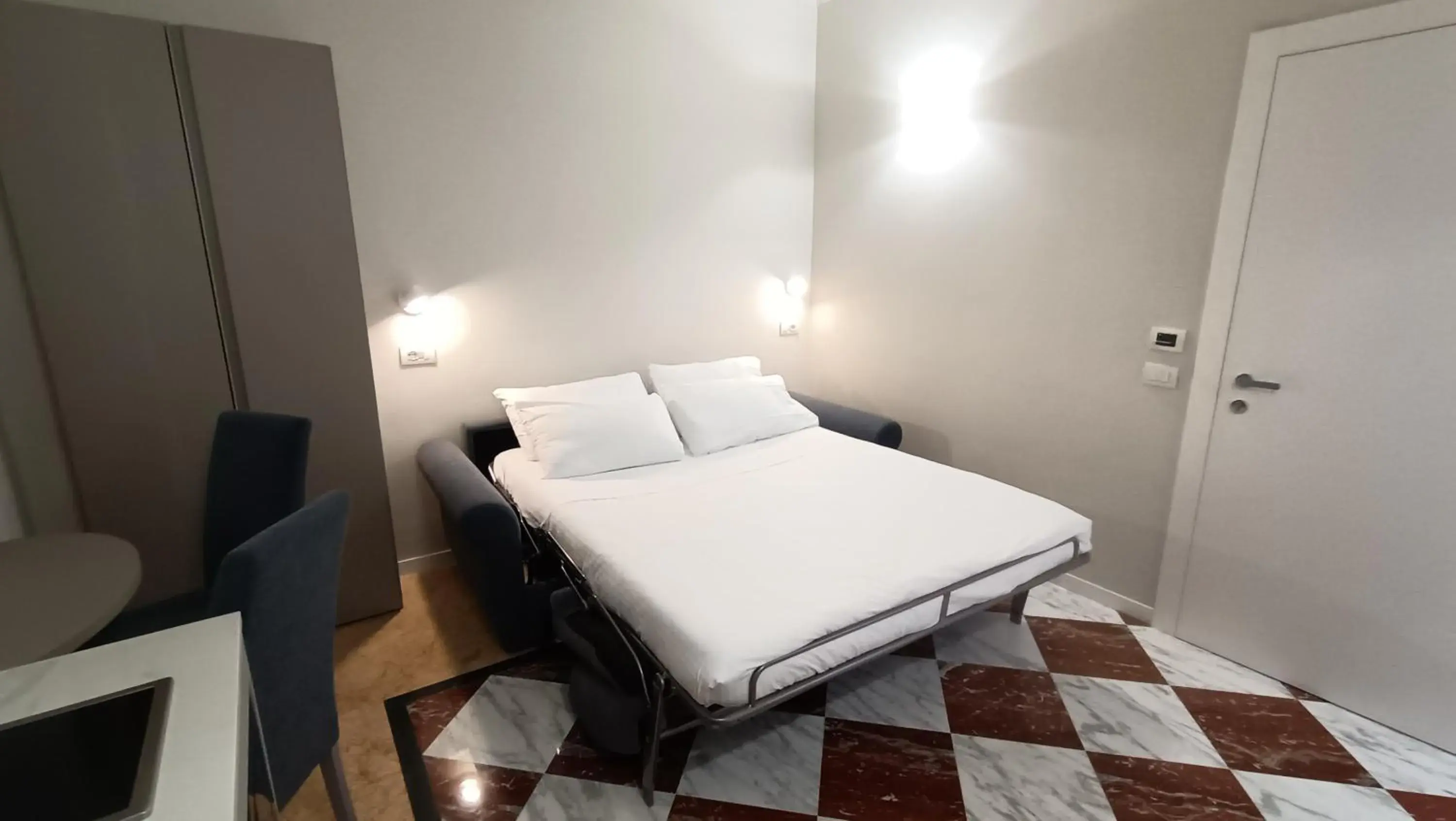 Bed in Andreola Central Hotel Bed in Andreola Central Hotel