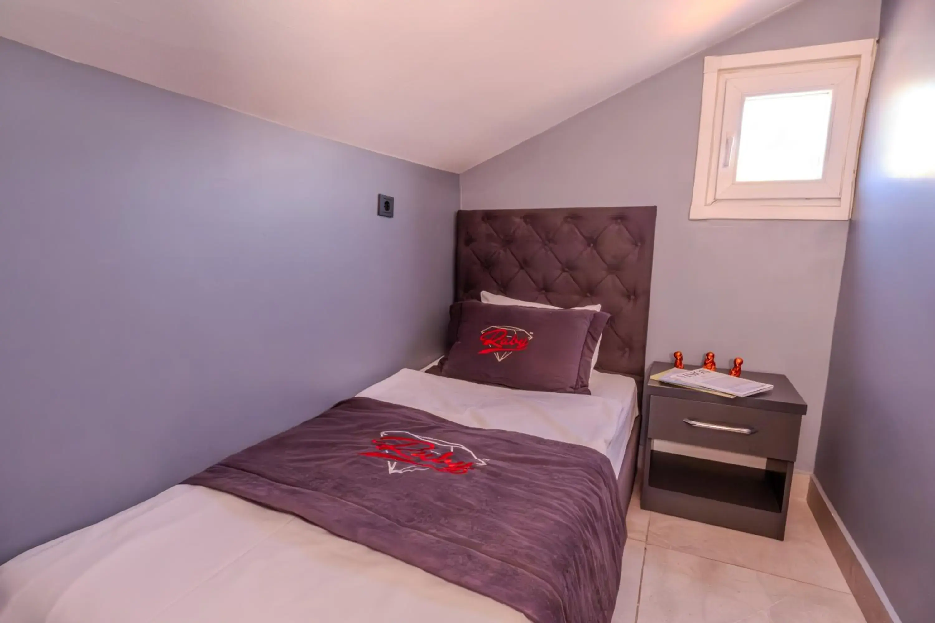 Bed in Ruby Hotel Bed in Ruby Hotel