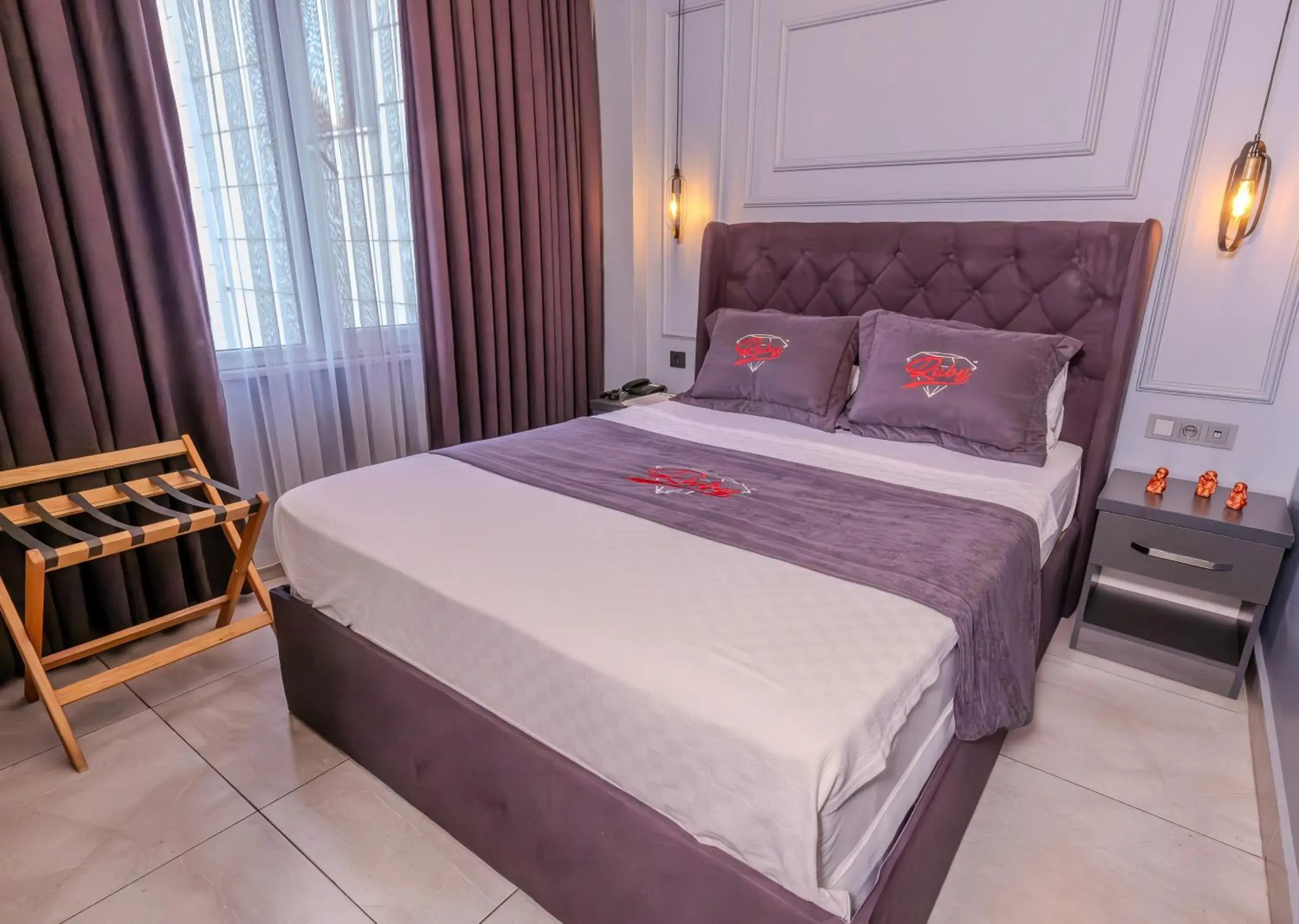 Bed in Ruby Hotel Bed in Ruby Hotel