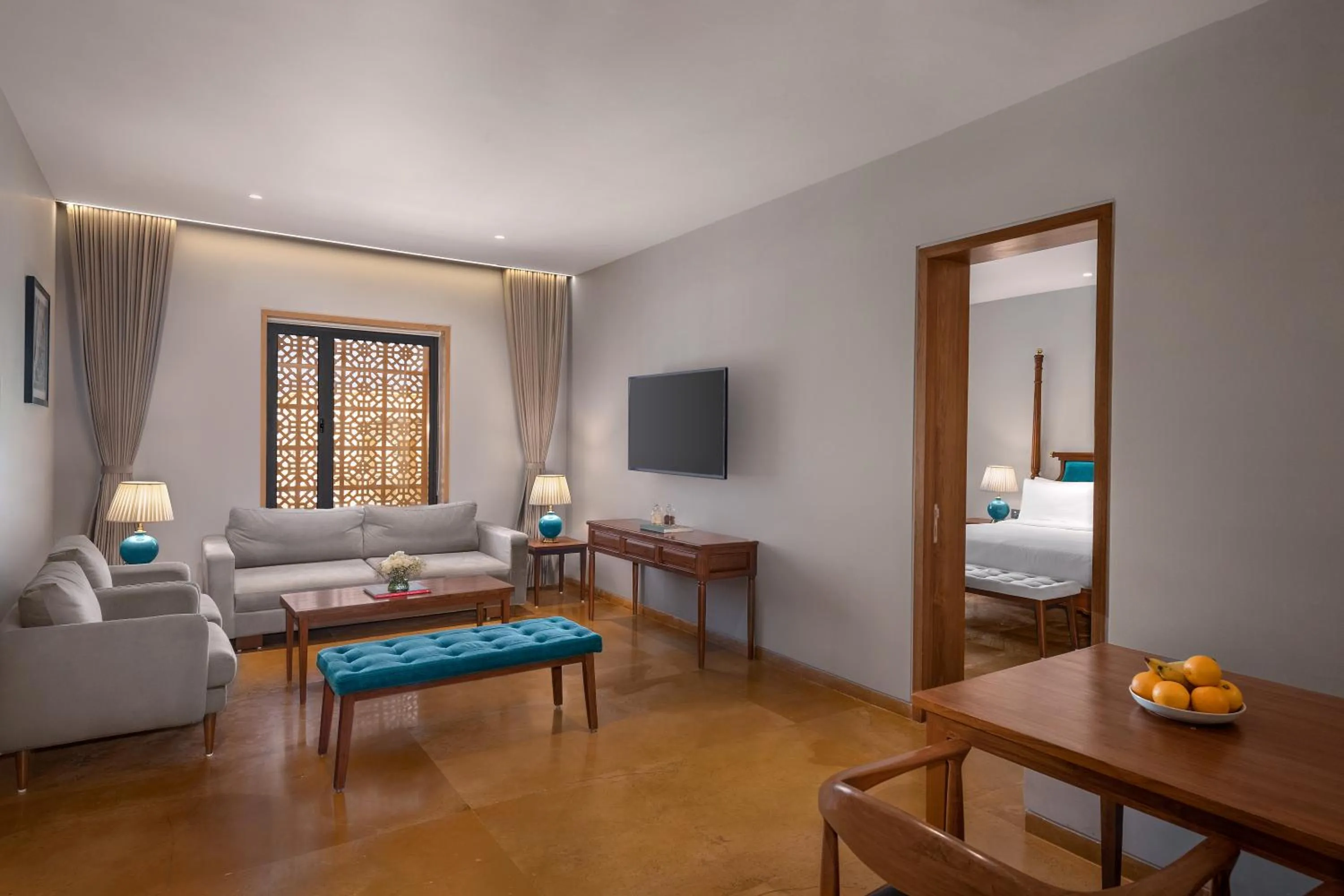 Living room, Bed in Time Square Resort & Spa Bhuj