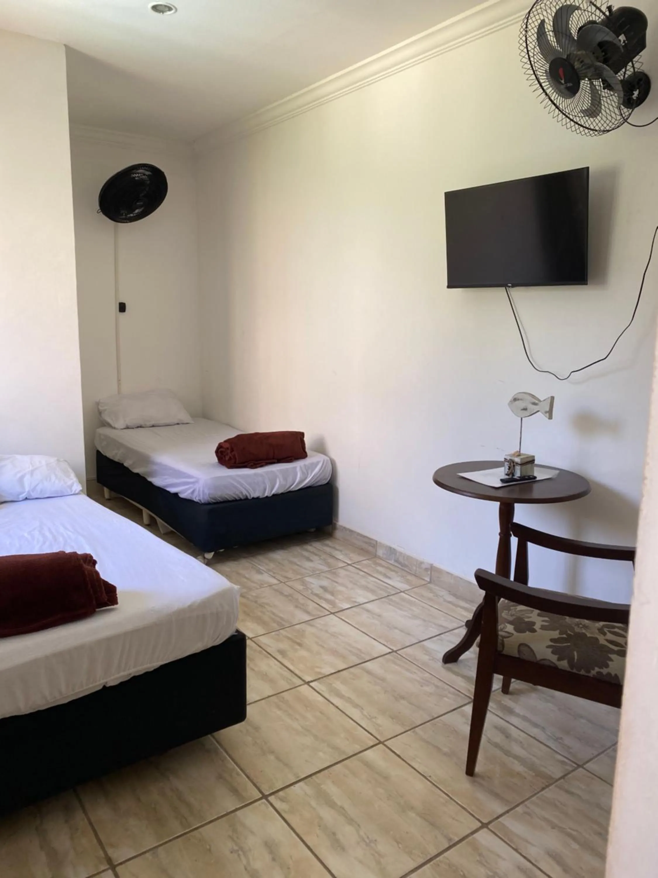 Bed in Pousada Casa de mãe aconchegante com piscina próximo à praia