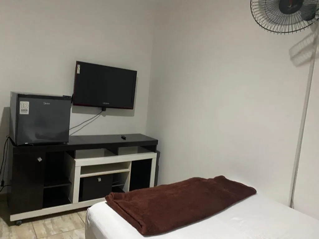 Bed in Pousada Casa de mãe aconchegante com piscina próximo à praia