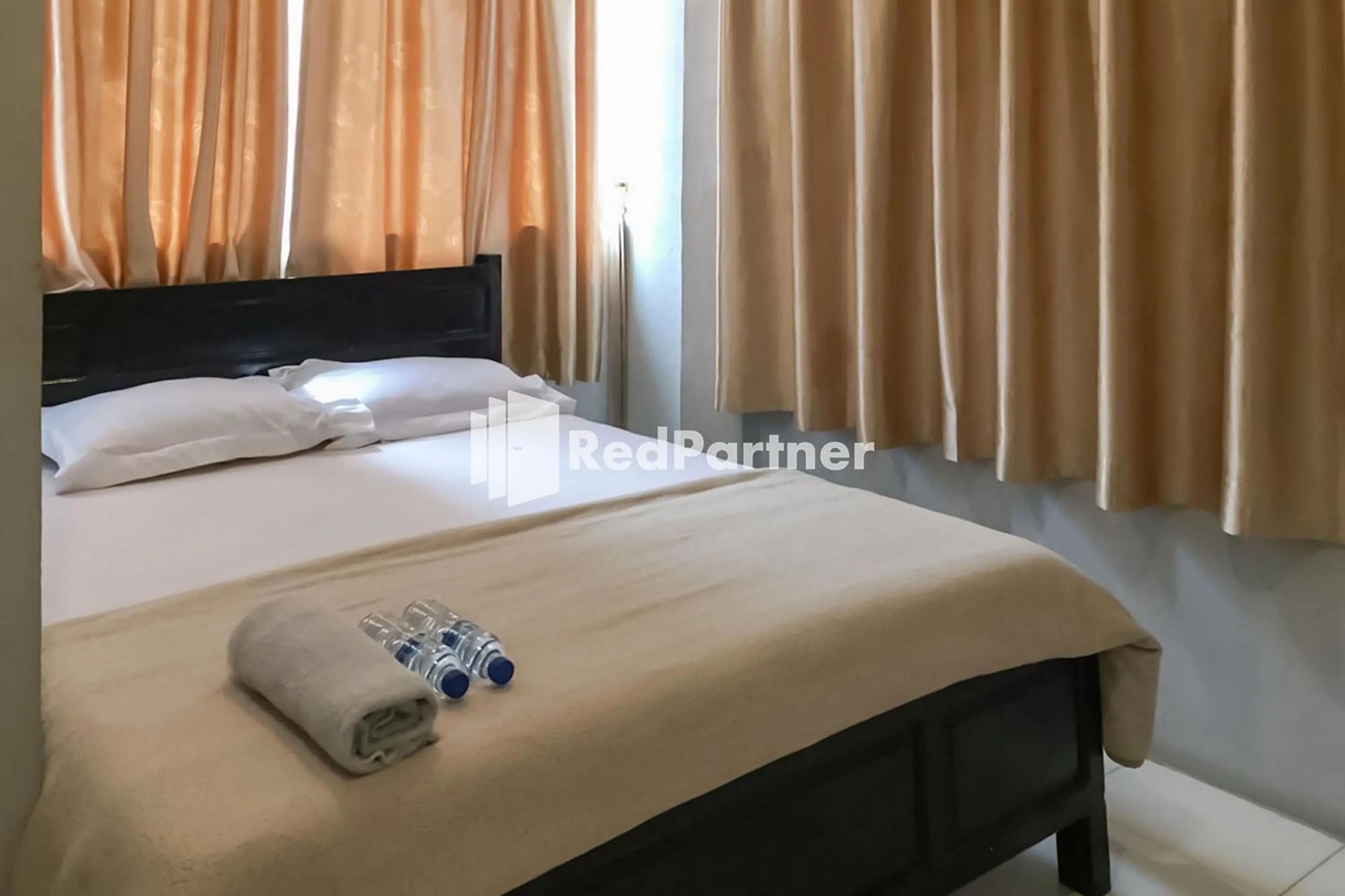 Bedroom, Bed in Aquino Marito Homestay Mitra RedDoorz