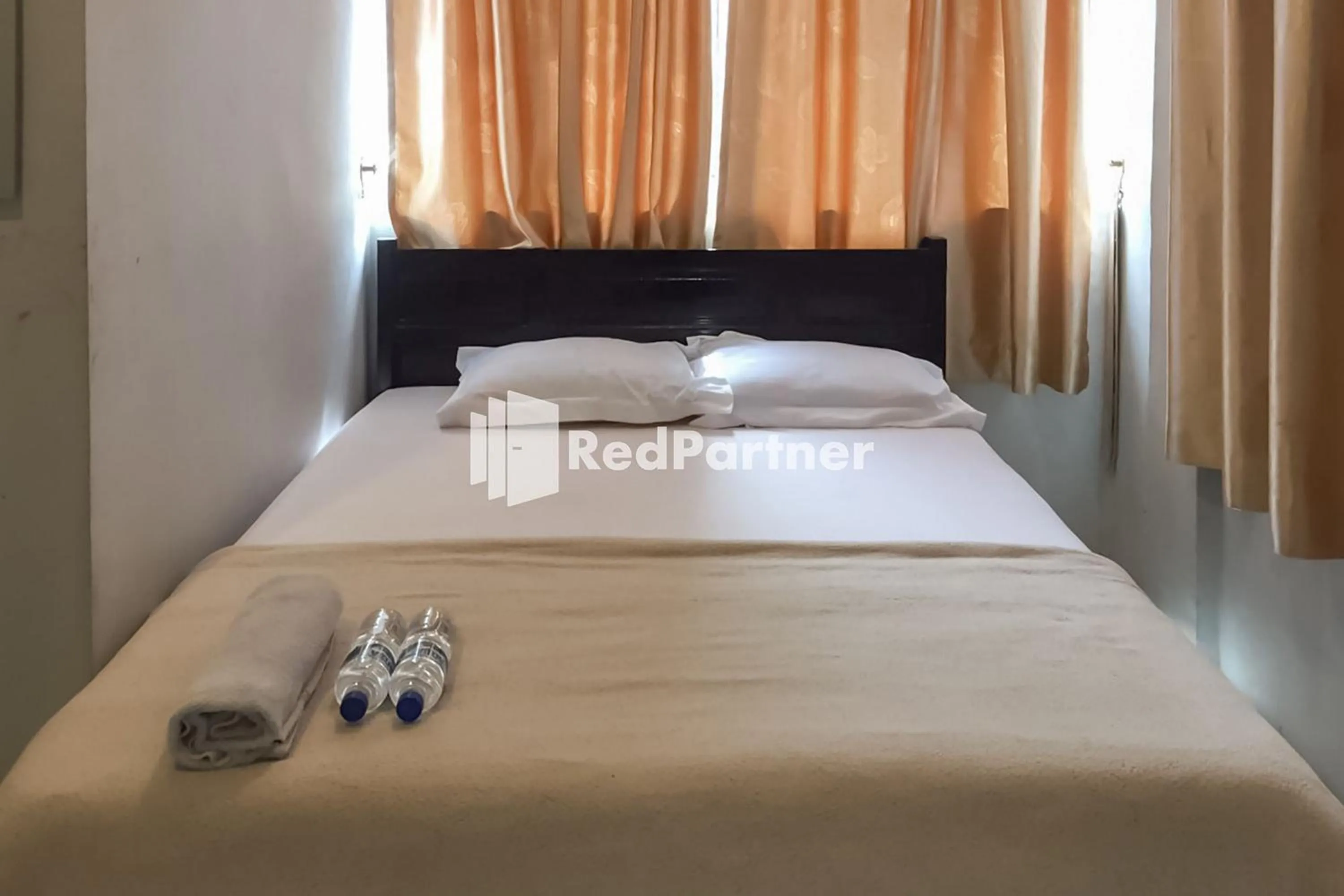 Bedroom, Bed in Aquino Marito Homestay Mitra RedDoorz