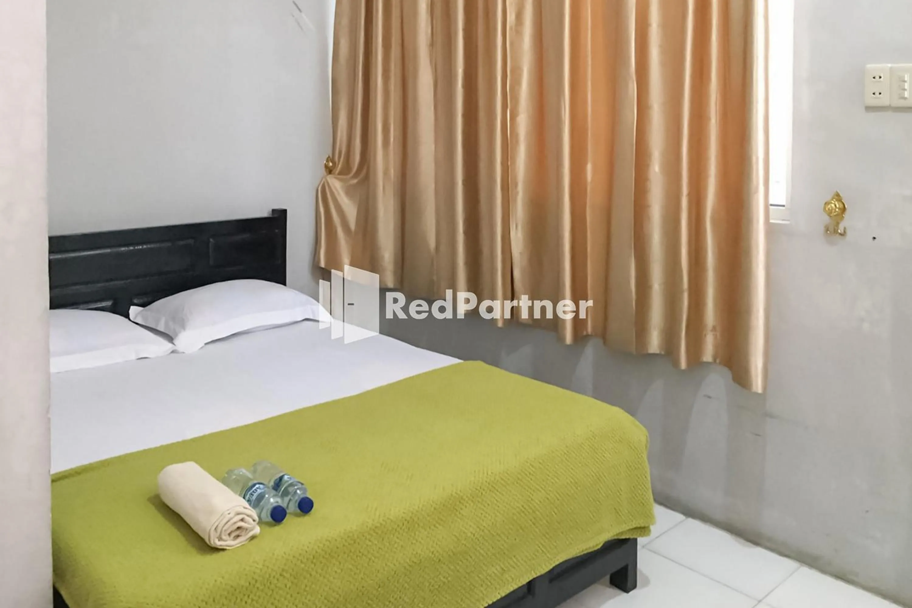 Bedroom, Bed in Aquino Marito Homestay Mitra RedDoorz