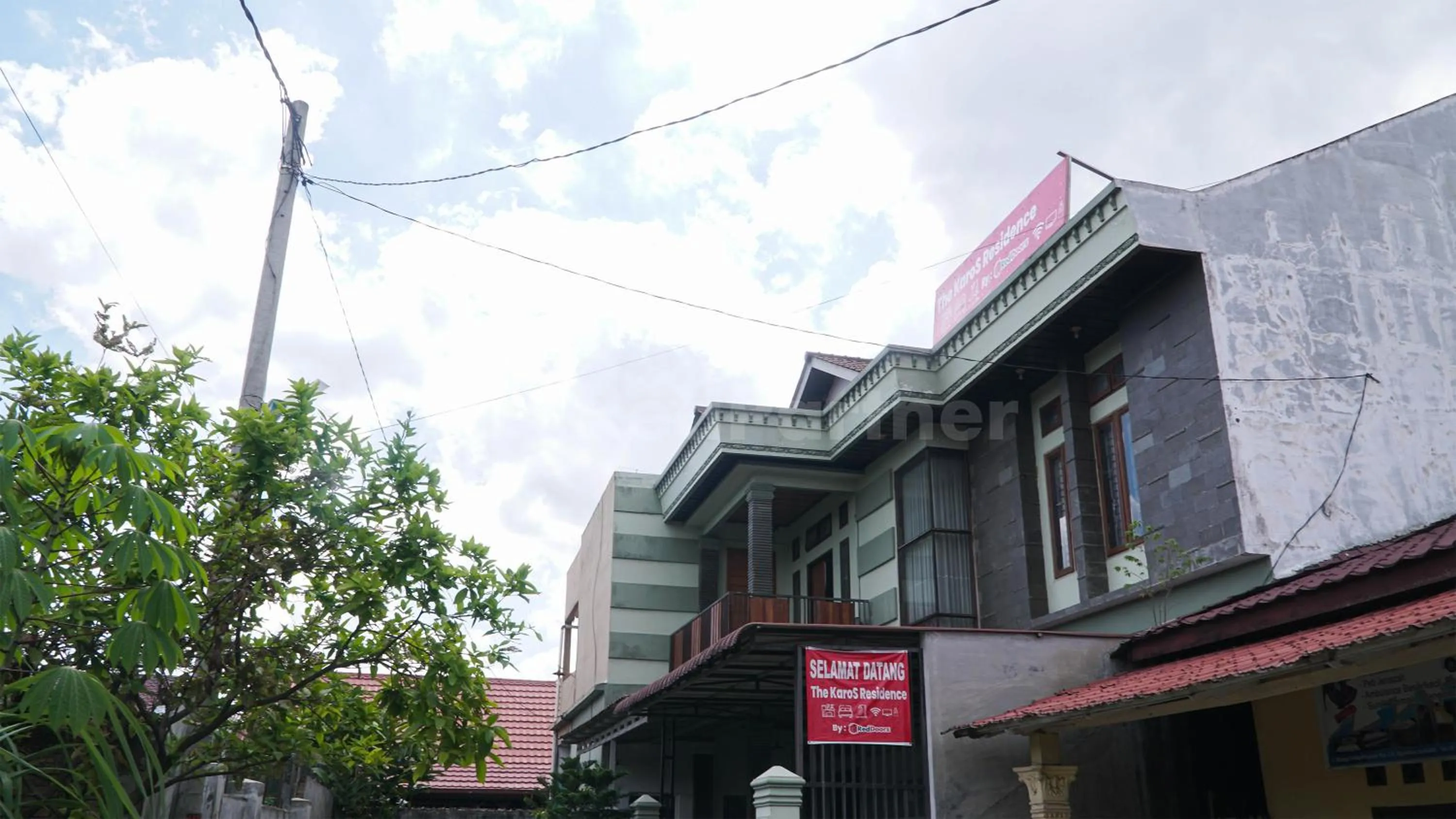 Property building in The Karo's Residence Mitra RedDoorz