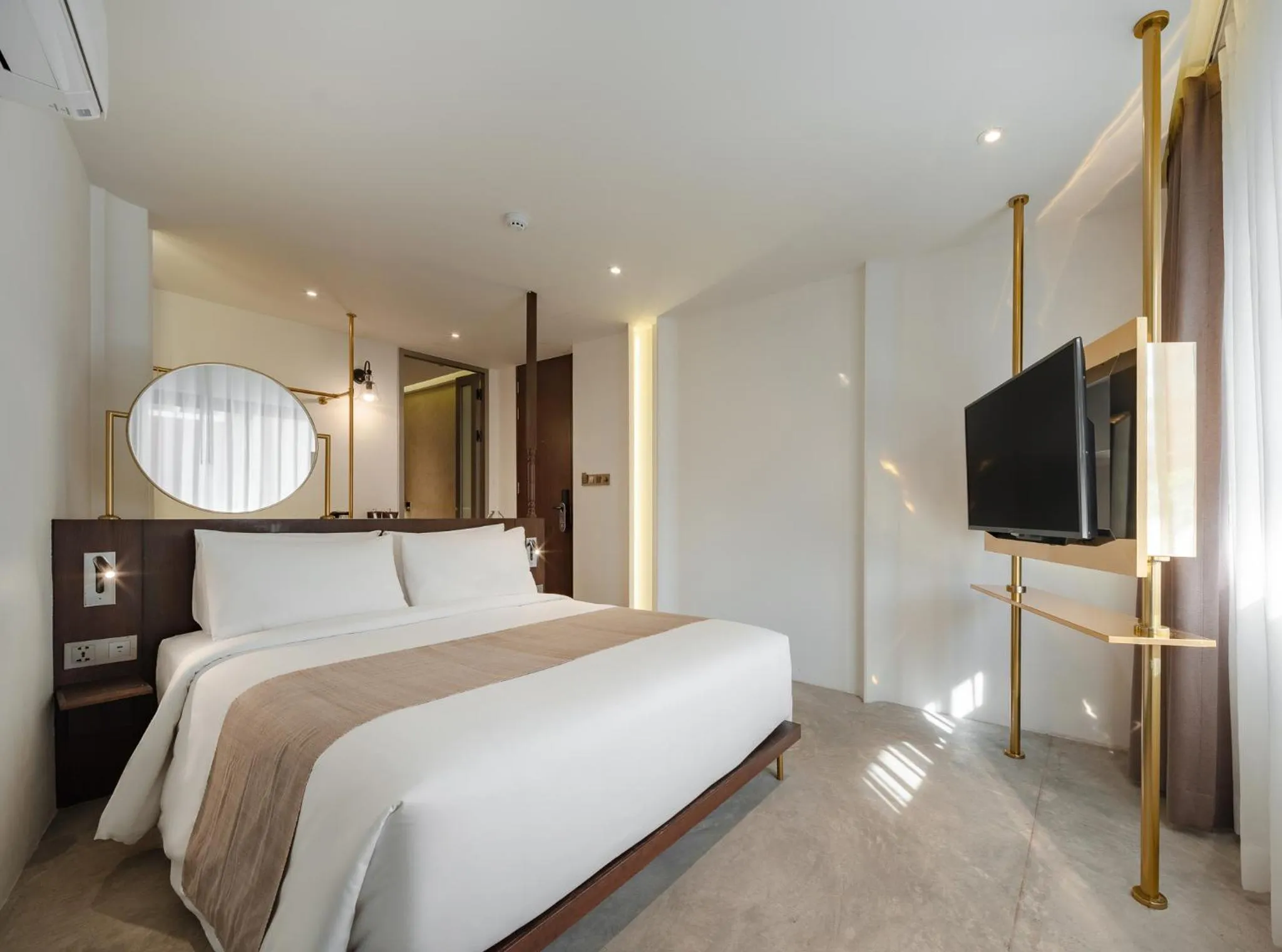 Bed in Nidhra Boutique Hotel Bangkok Sukhumvit