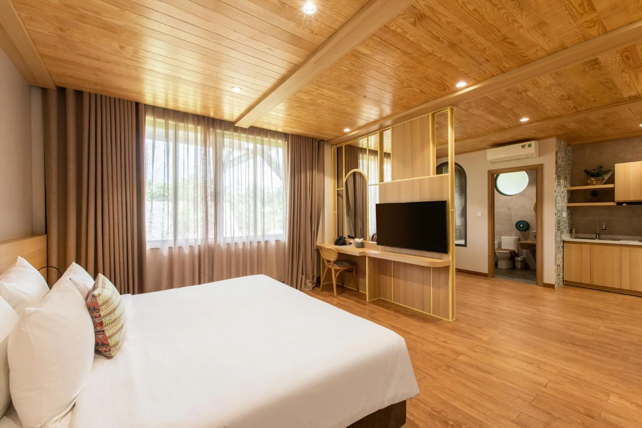 Communal lounge/ TV room, Bed in Hami Garden - Authentic & Natural Resort