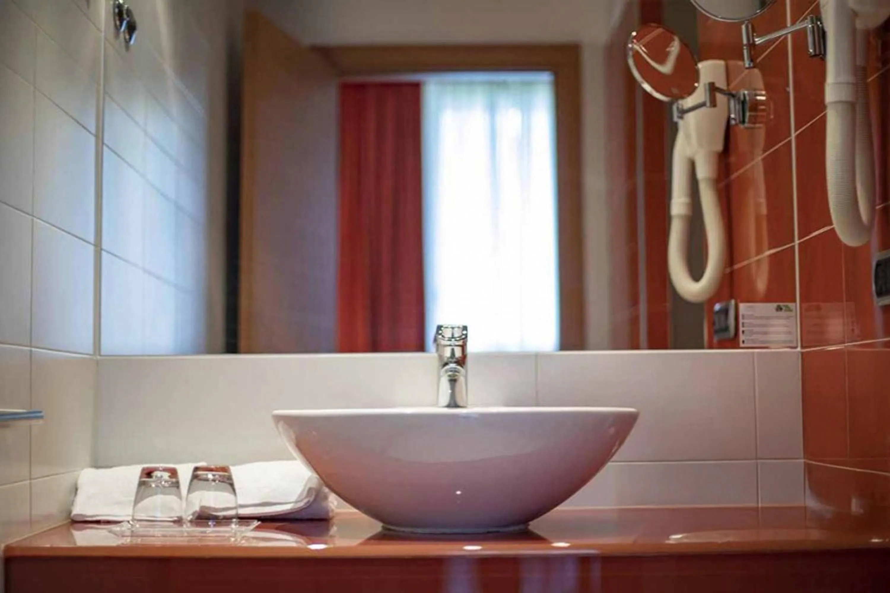 Bathroom in B&B HOTEL Remilia