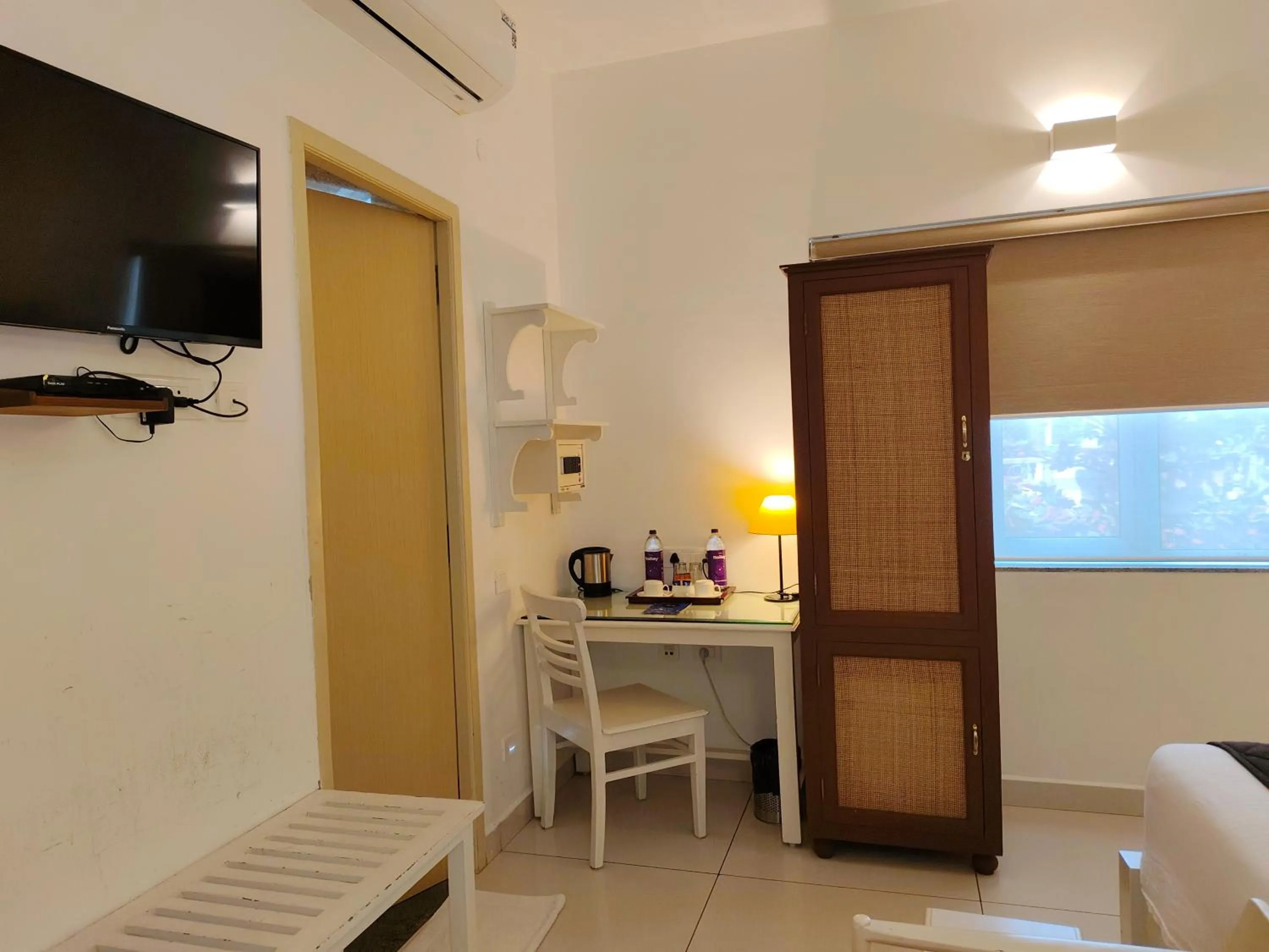 Bedroom in Hotel Aura by Woco Stays