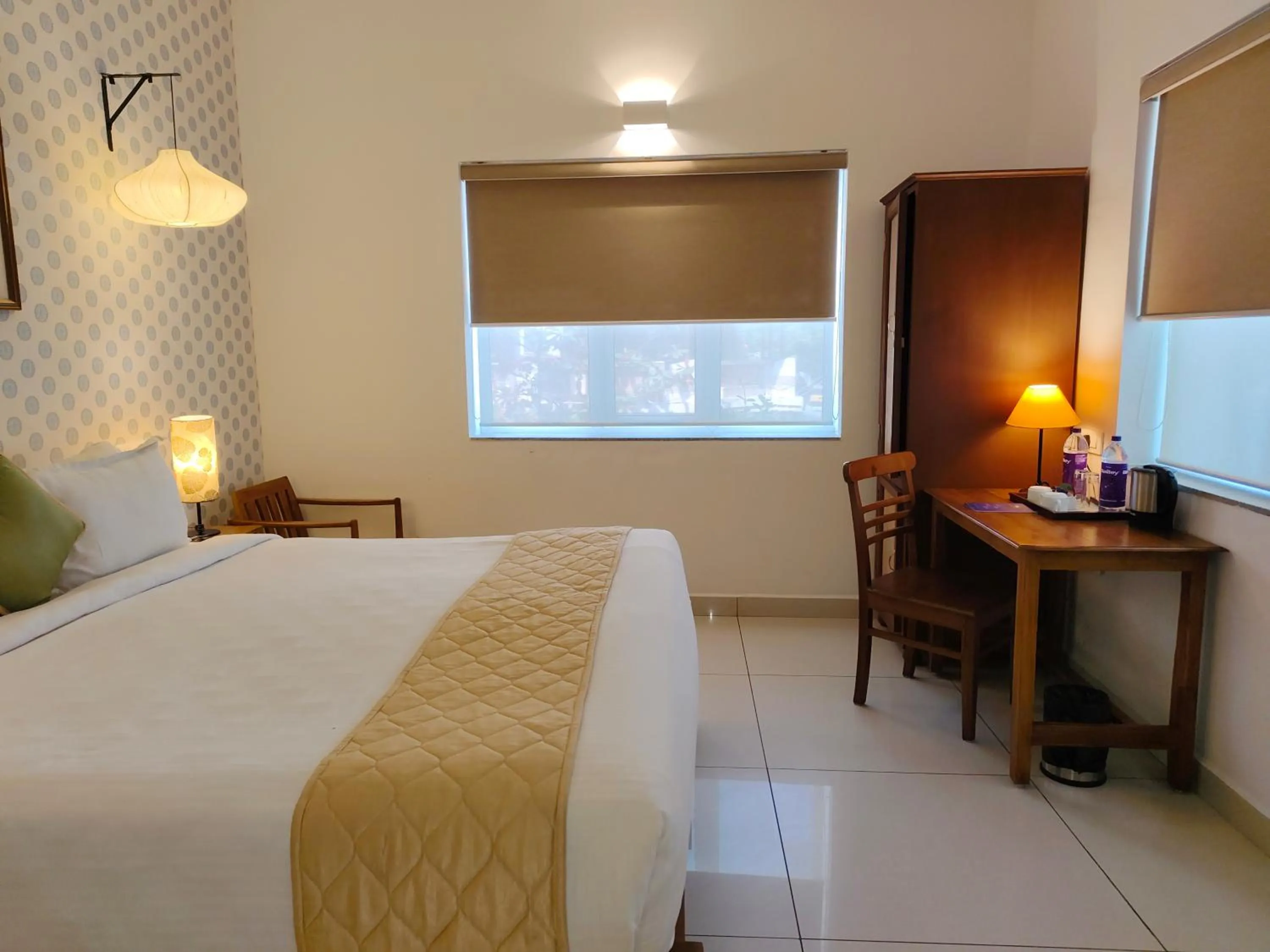 Bed in Hotel Aura by Woco Stays