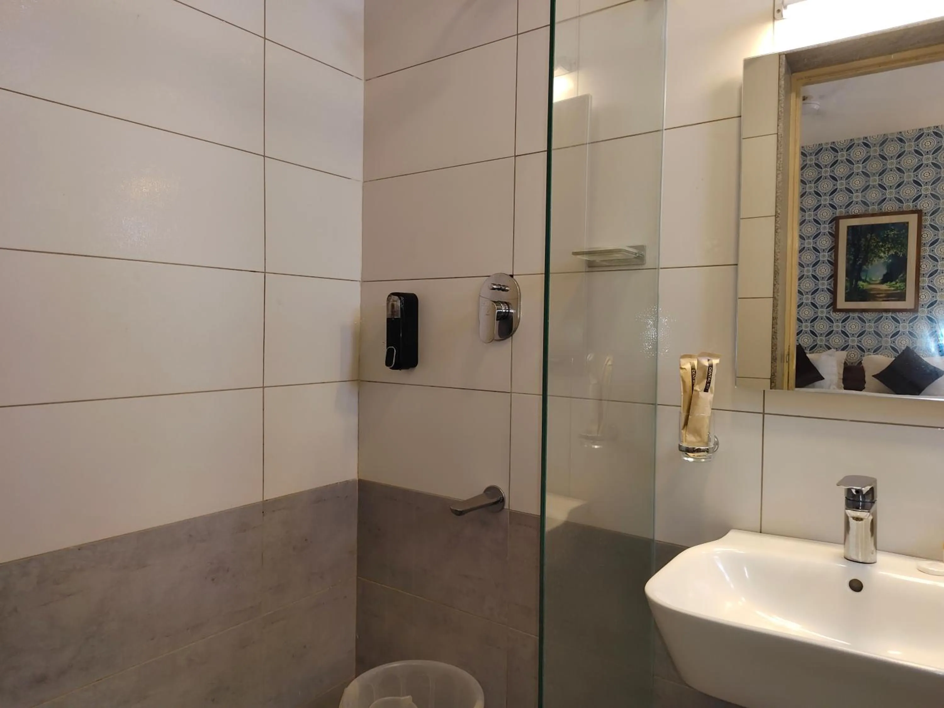 Bathroom in Hotel Aura by Woco Stays