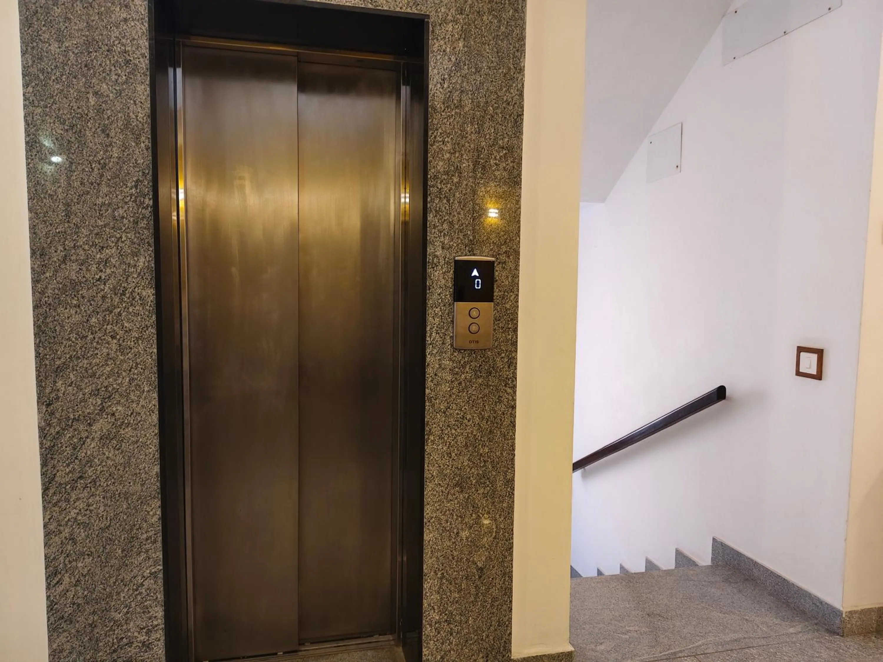 elevator in Hotel Aura by Woco Stays