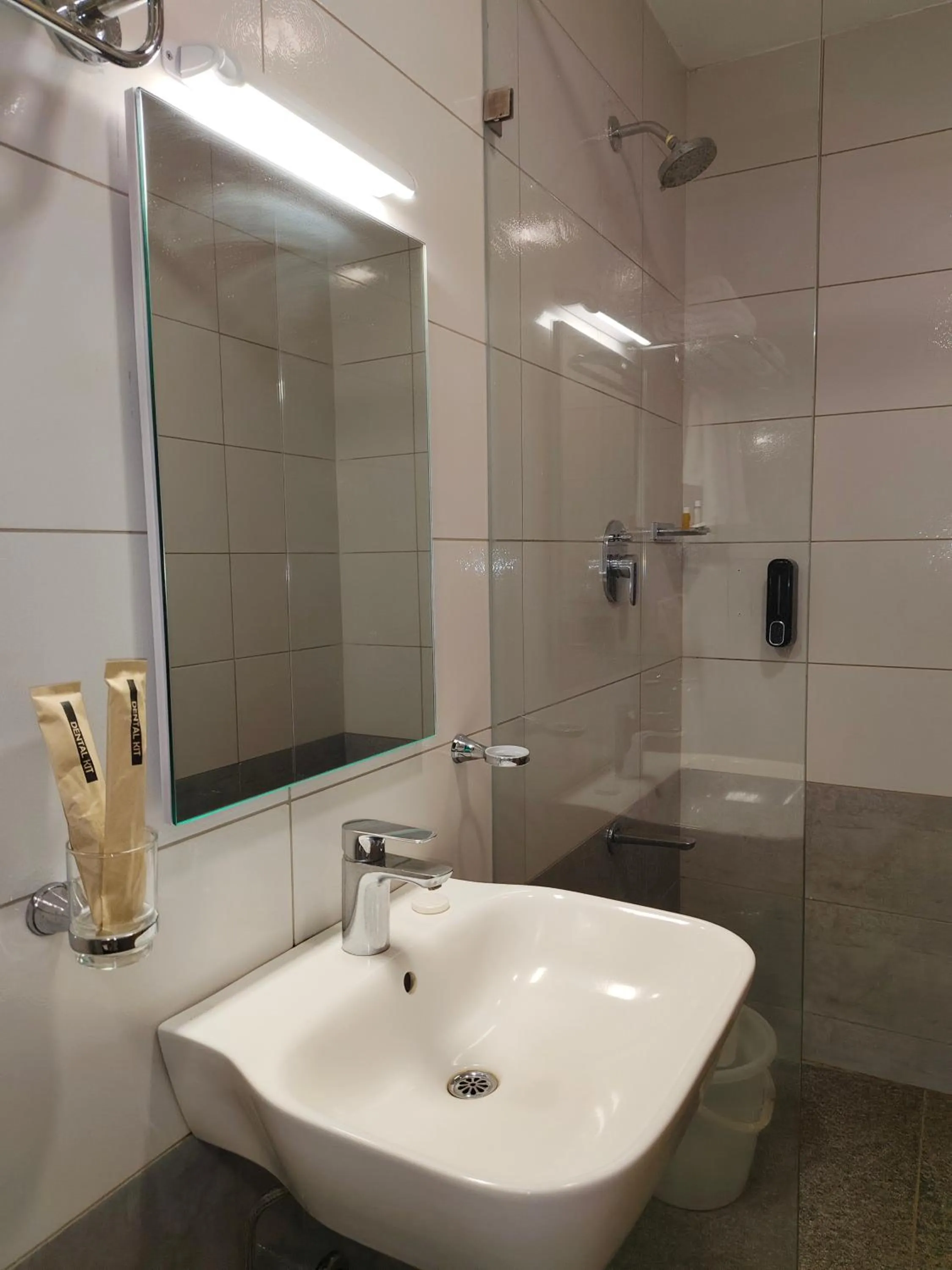 Bathroom in Hotel Aura by Woco Stays