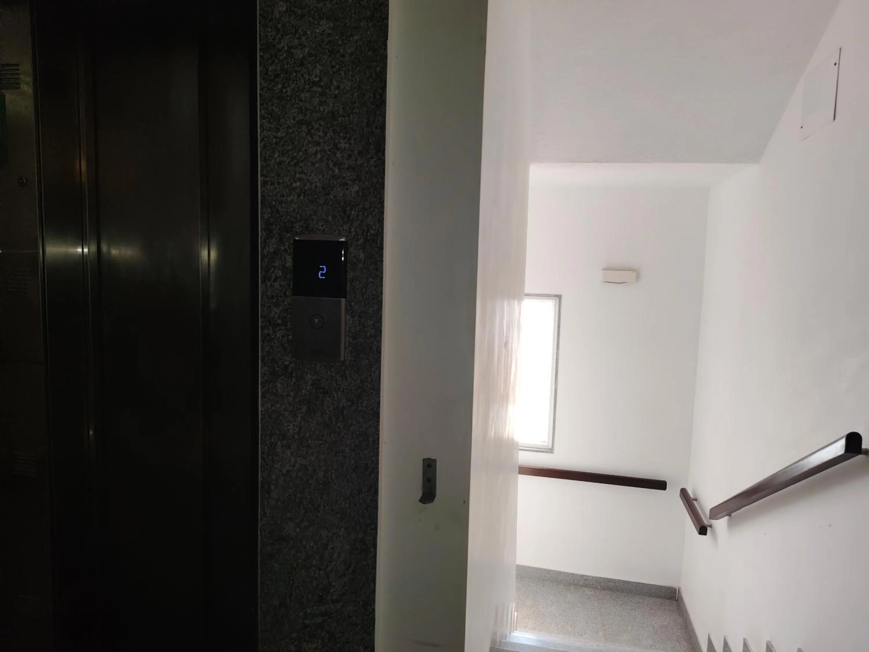 elevator in Hotel Aura by Woco Stays