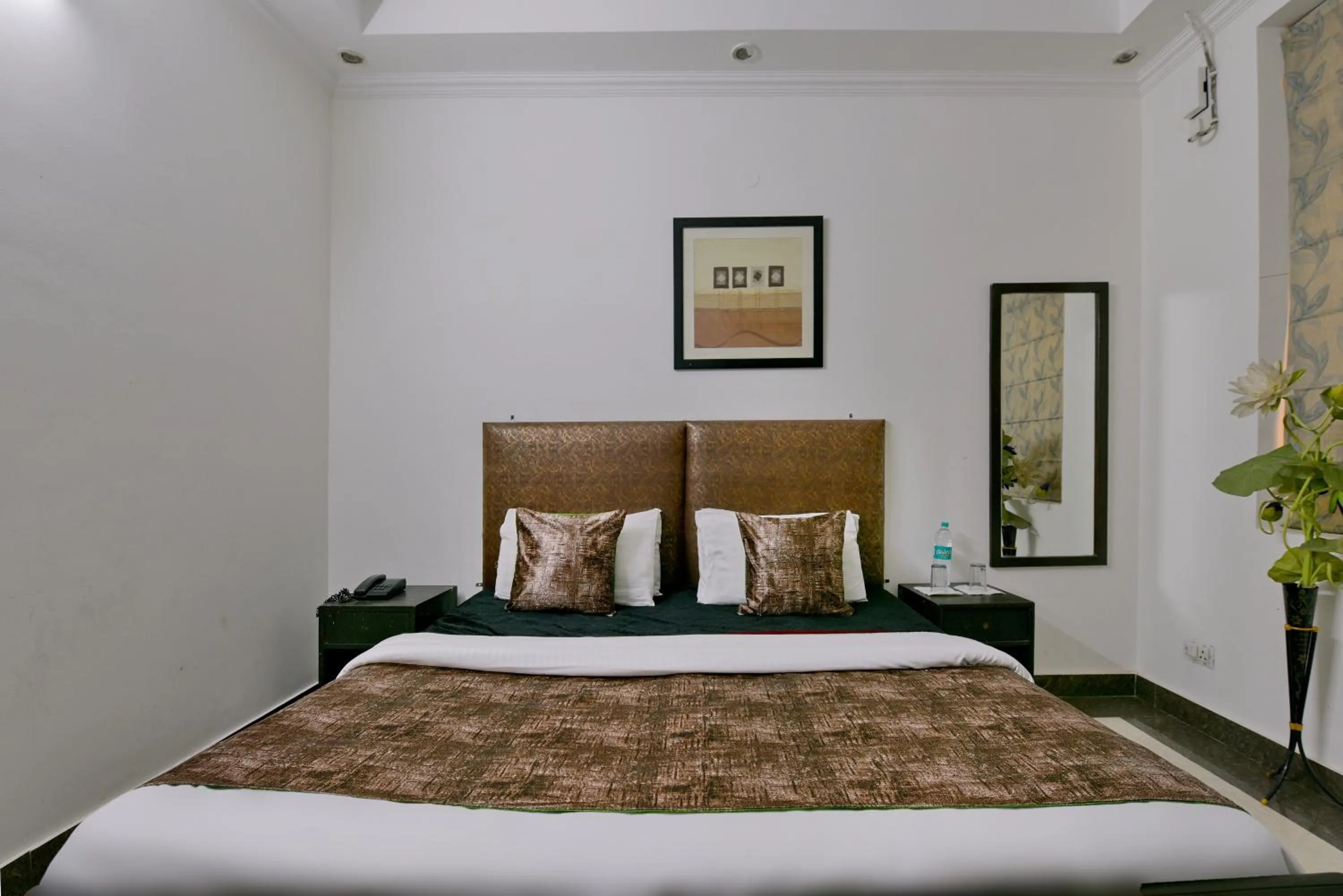 Bed in Hotel Diamond Stays