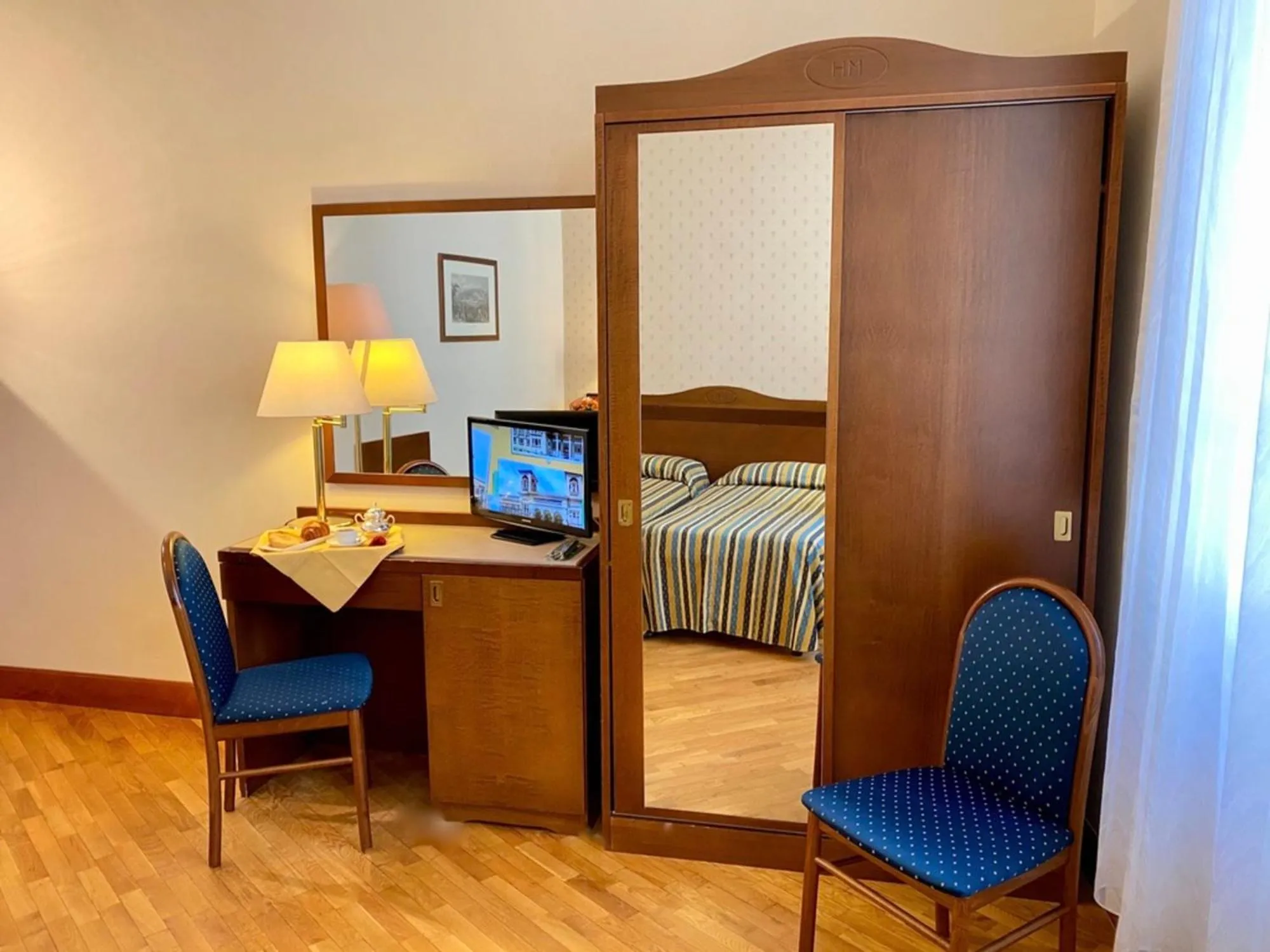 hair dresser, Bed in Hotel Martelli