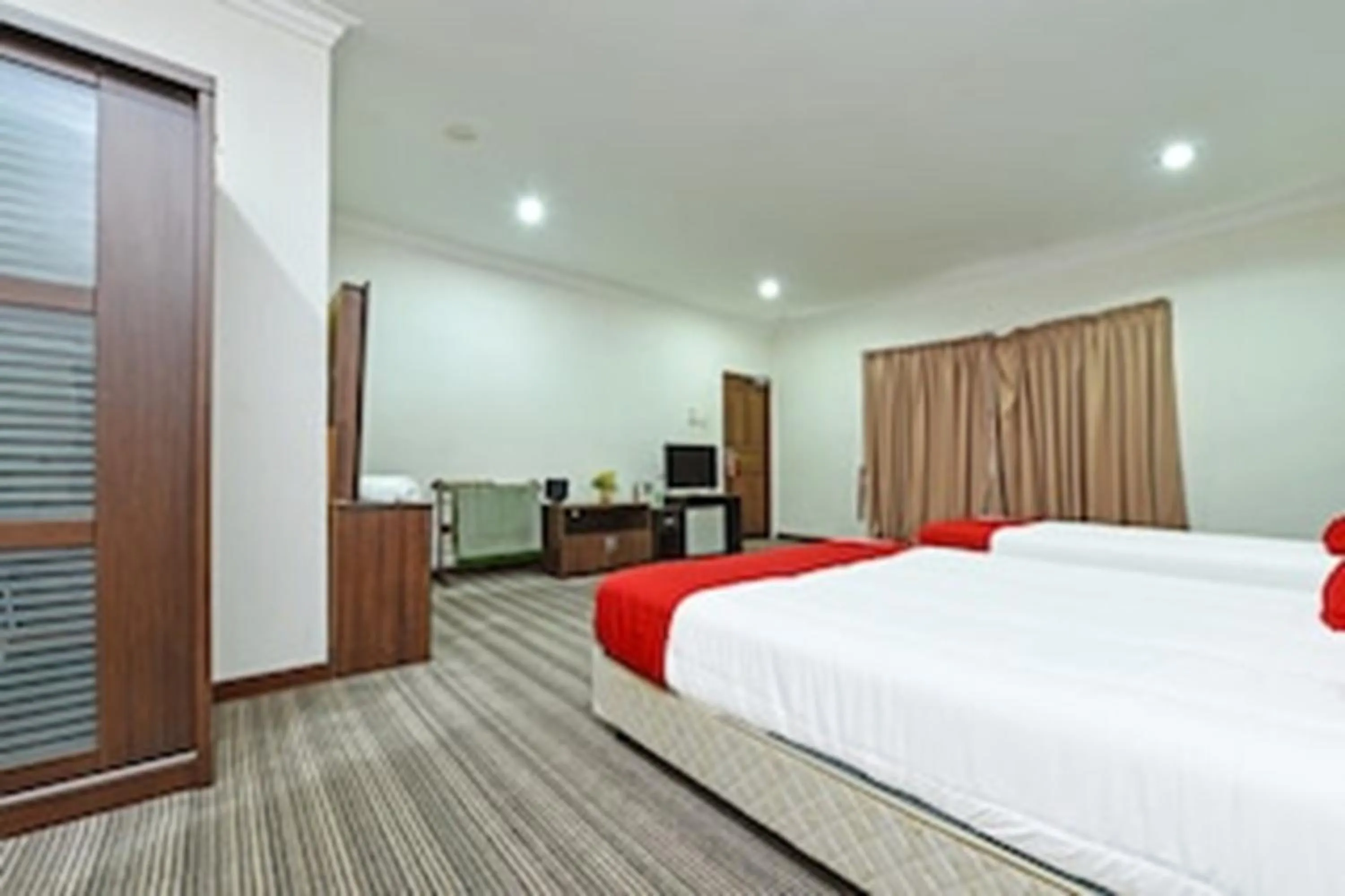 TV and multimedia, Bed in Capital O 90434 Marmoris House