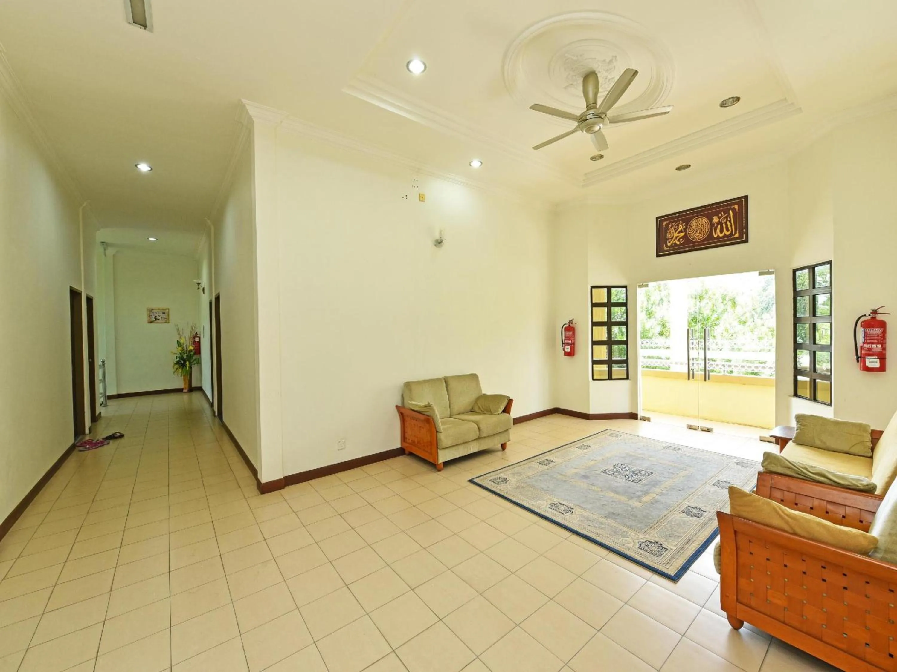 Lobby or reception in Capital O 90434 Marmoris House