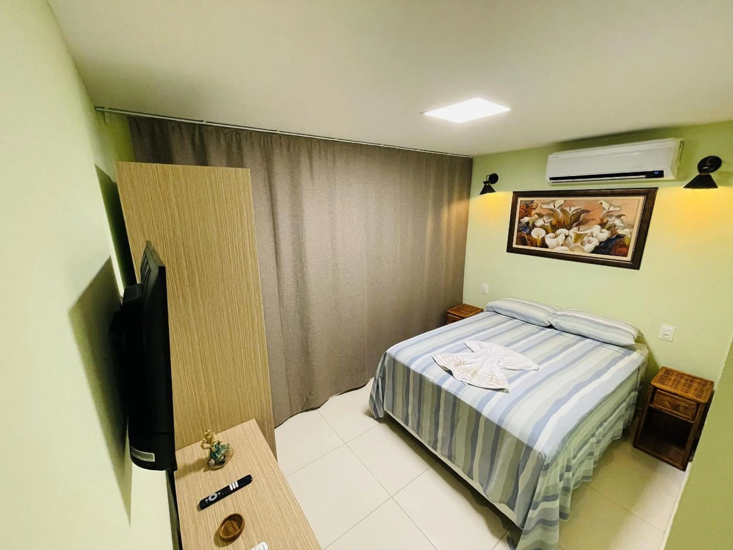 Photo of the whole room, Bed in Hotel Pousada Flor de Alecrim