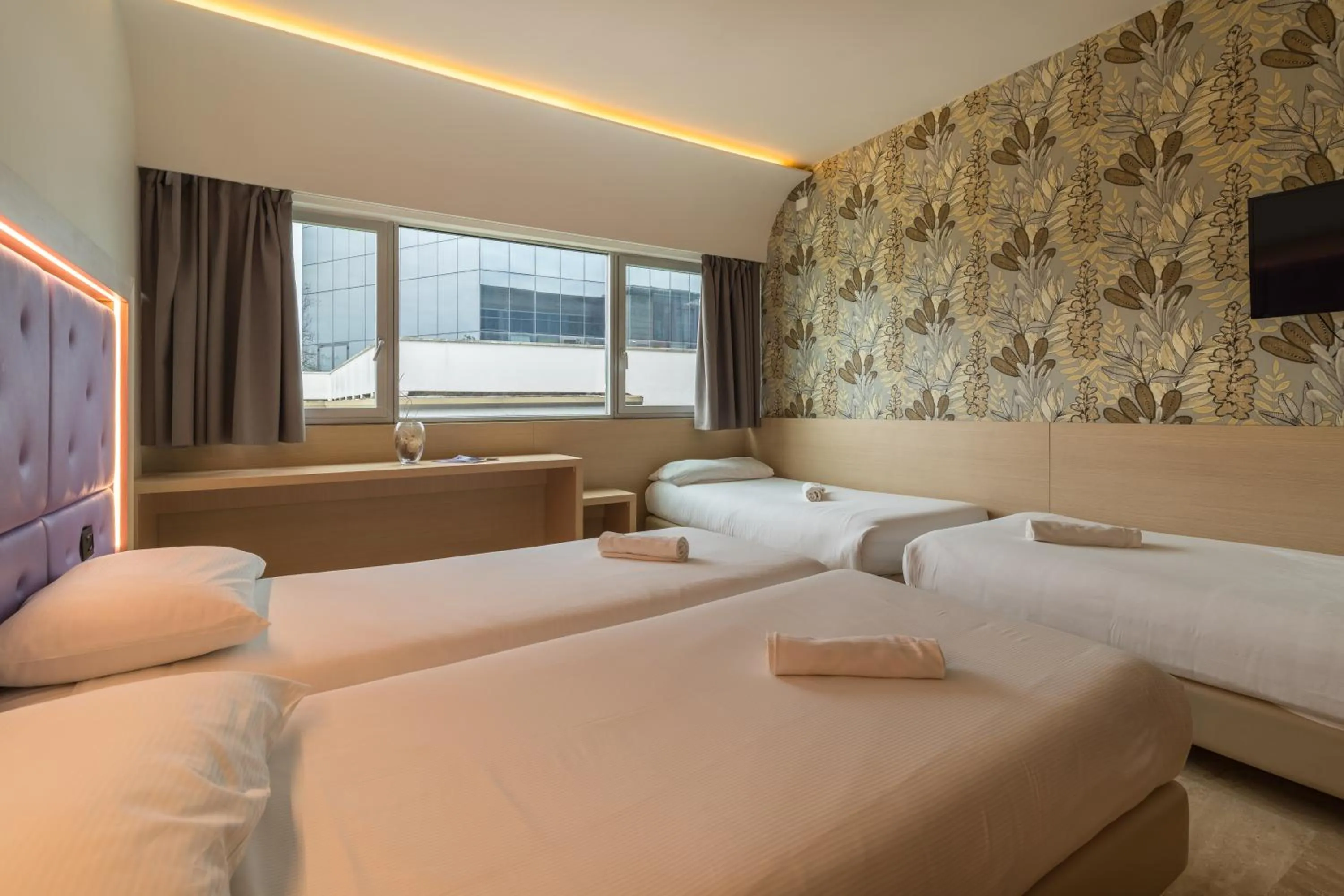 Bed in Hotel Antares Sport Beauty & Wellness