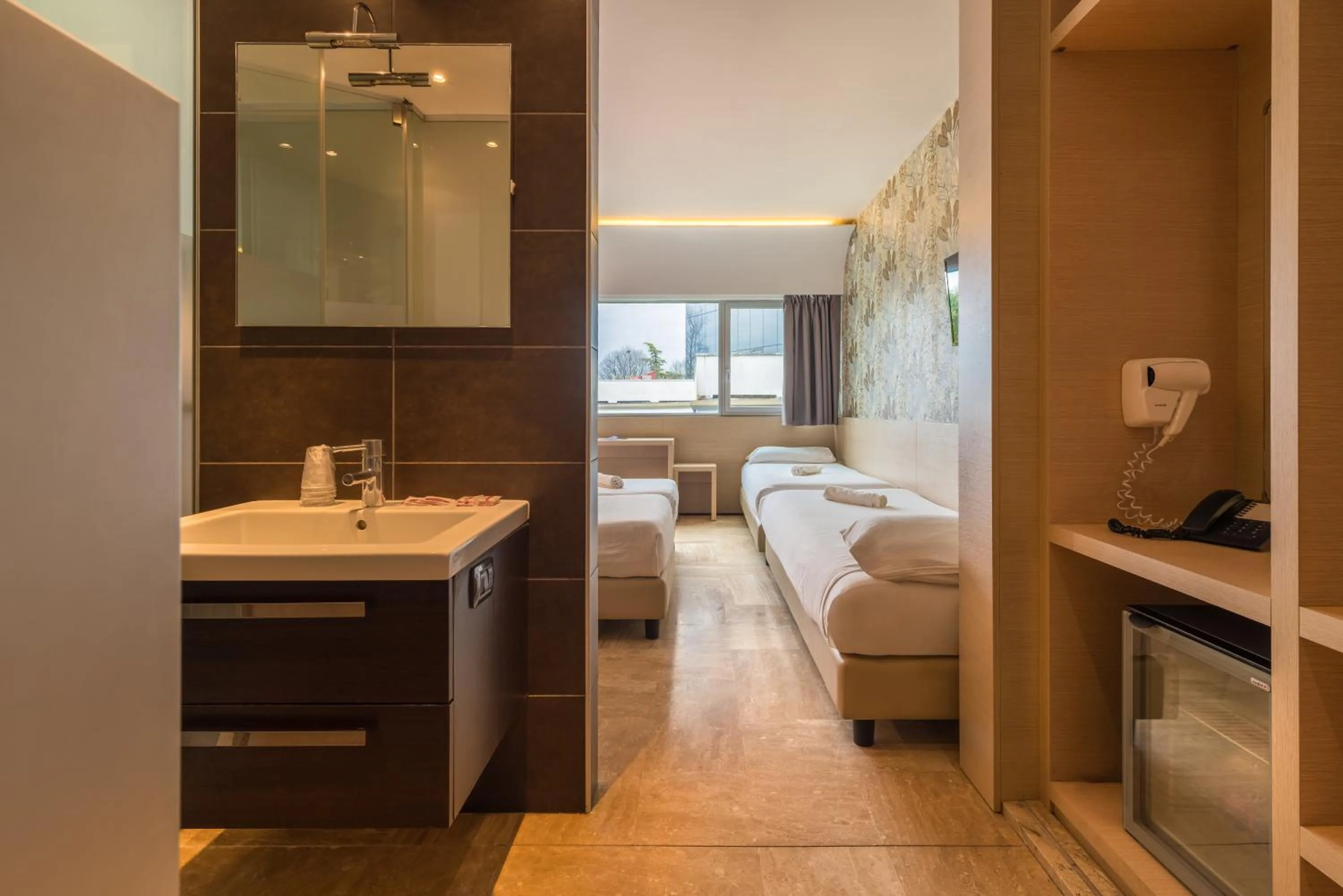 Bed in Hotel Antares Sport Beauty & Wellness