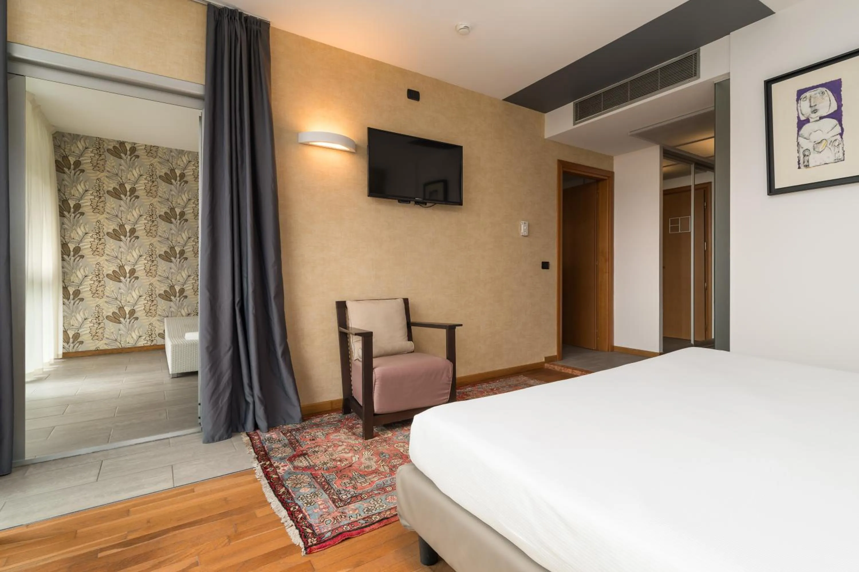 Bed in Hotel Antares Sport Beauty & Wellness