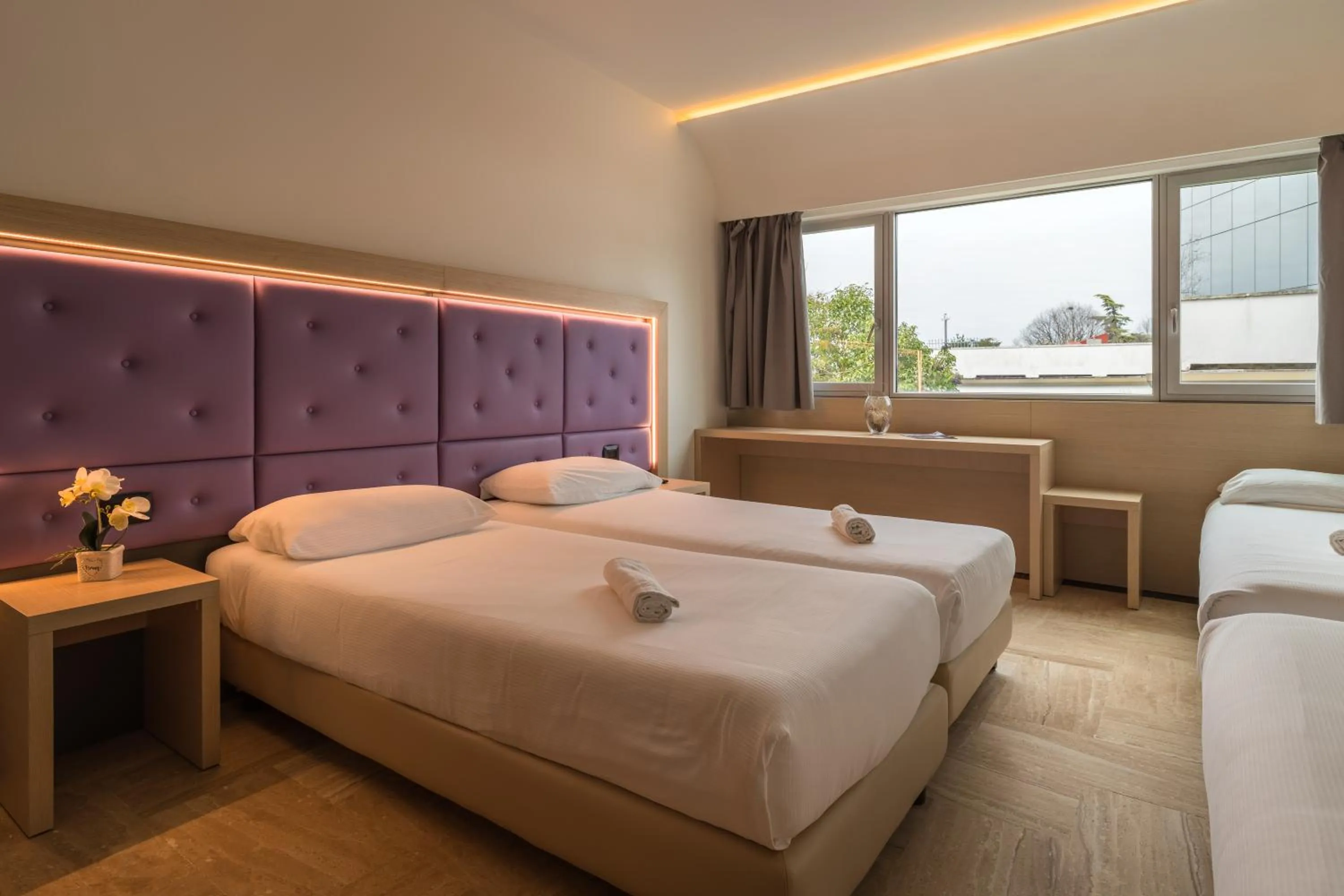Bed in Hotel Antares Sport Beauty & Wellness