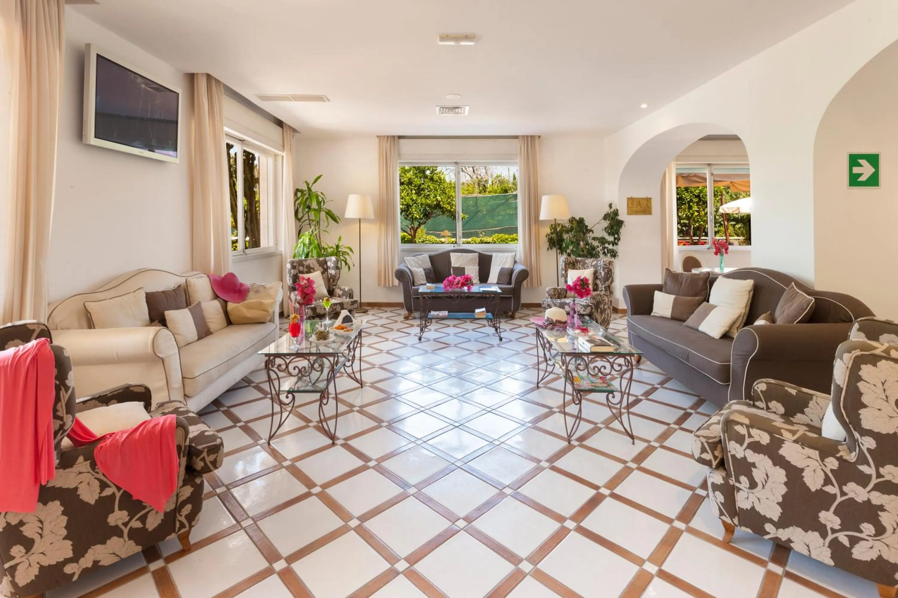 Communal lounge/ TV room in Hotel Alpha