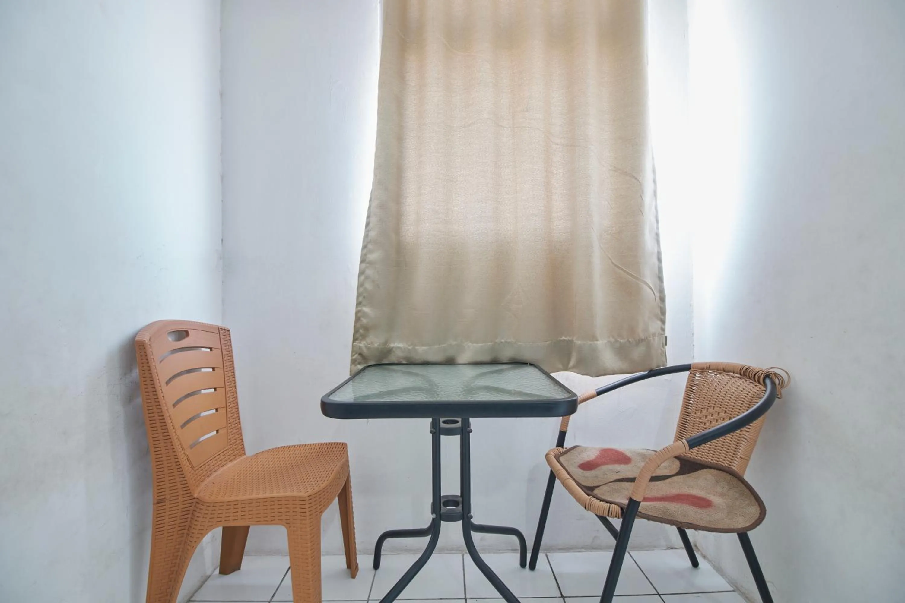 Seating area in Room Rendi Gunung Putri Square
