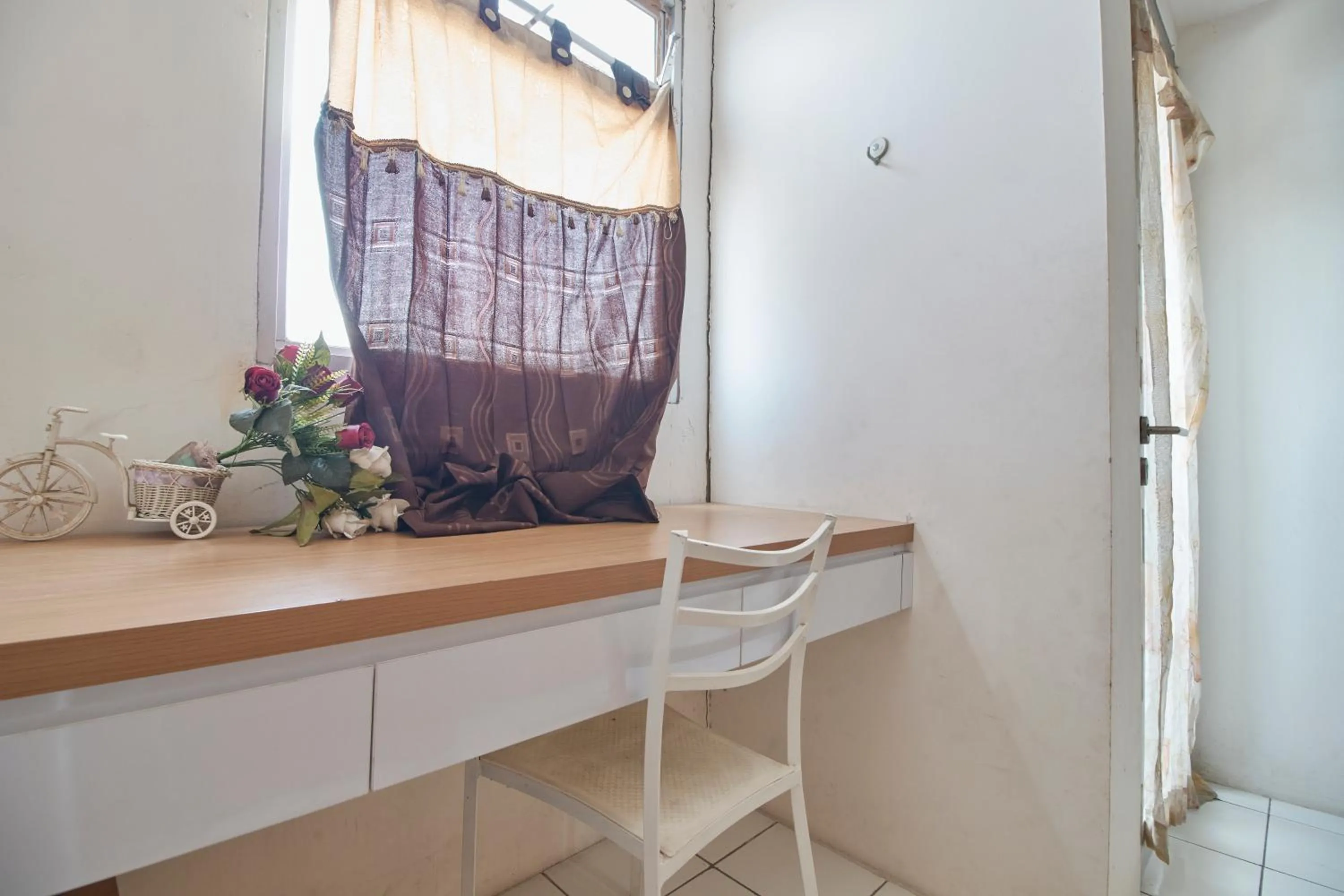 Seating area in Room Rendi Gunung Putri Square
