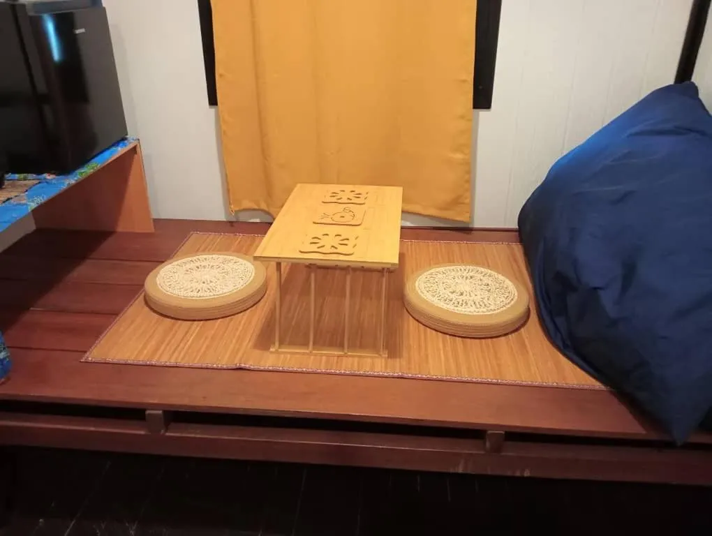 Seating area, Bed in The Station Tioman